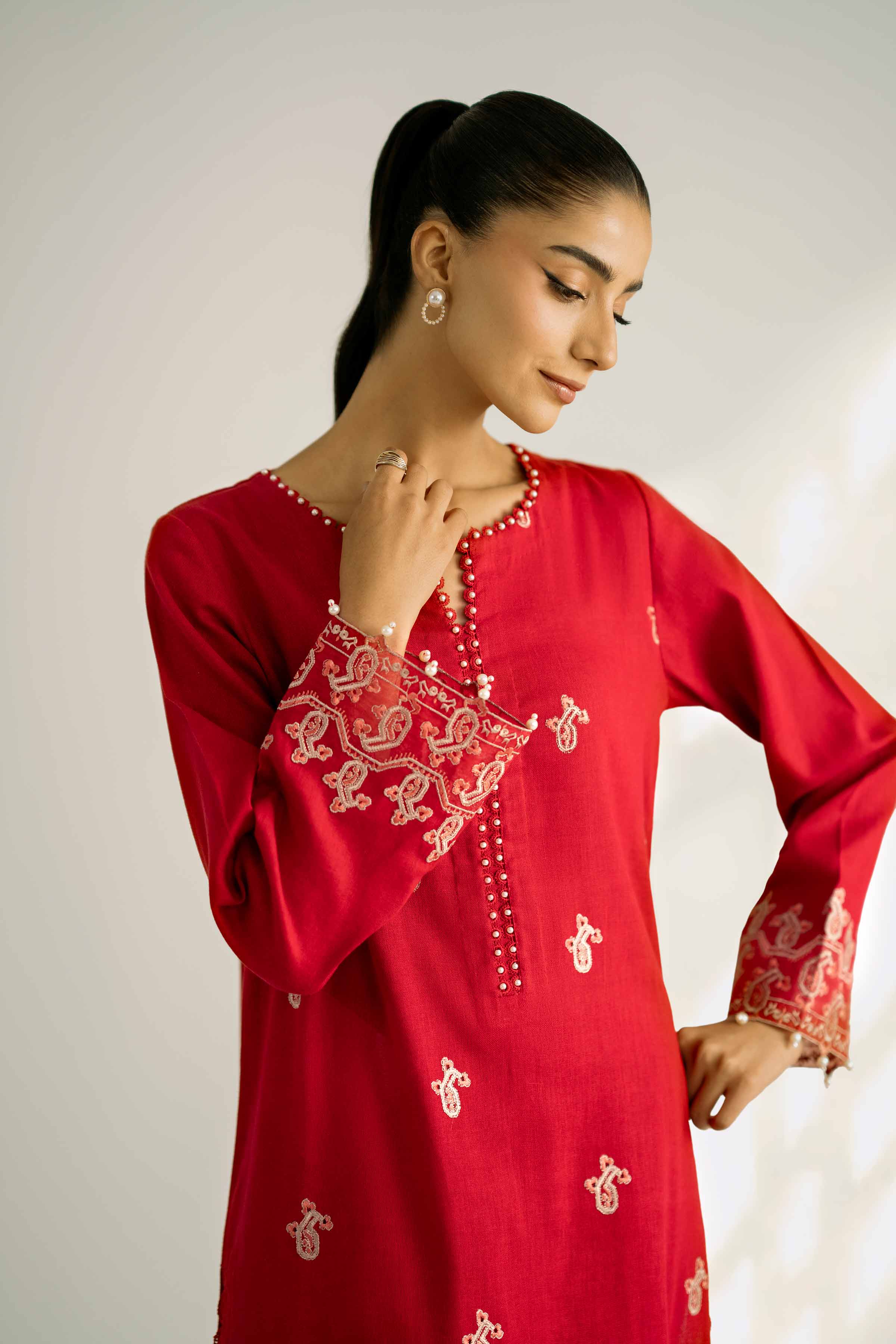 NISHATUAE - Red Embroidered Khaddar 2-piece Unstitched Dress