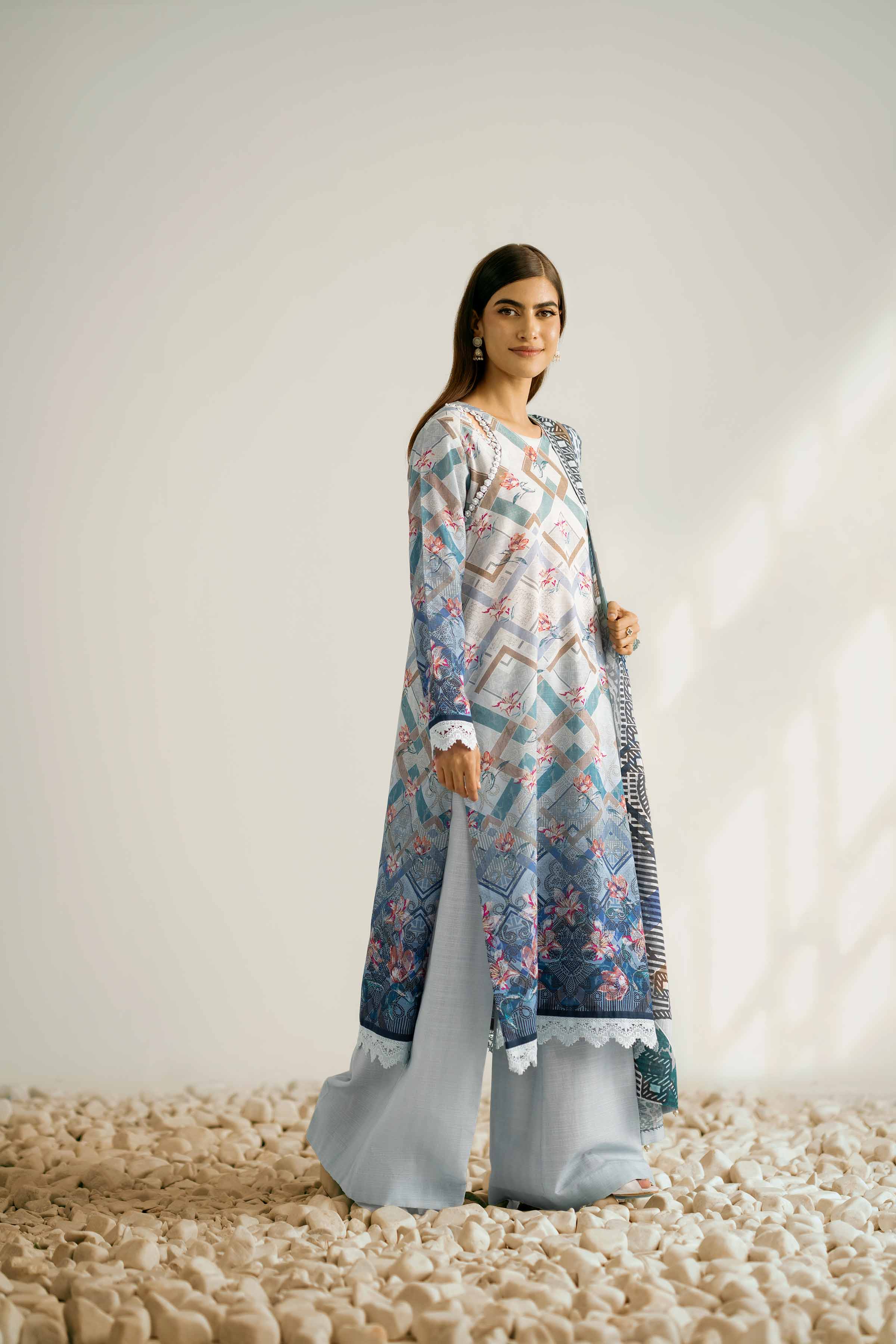 NISHATUAE - Blue Printed Khaddar 3-piece Unstitched Suit