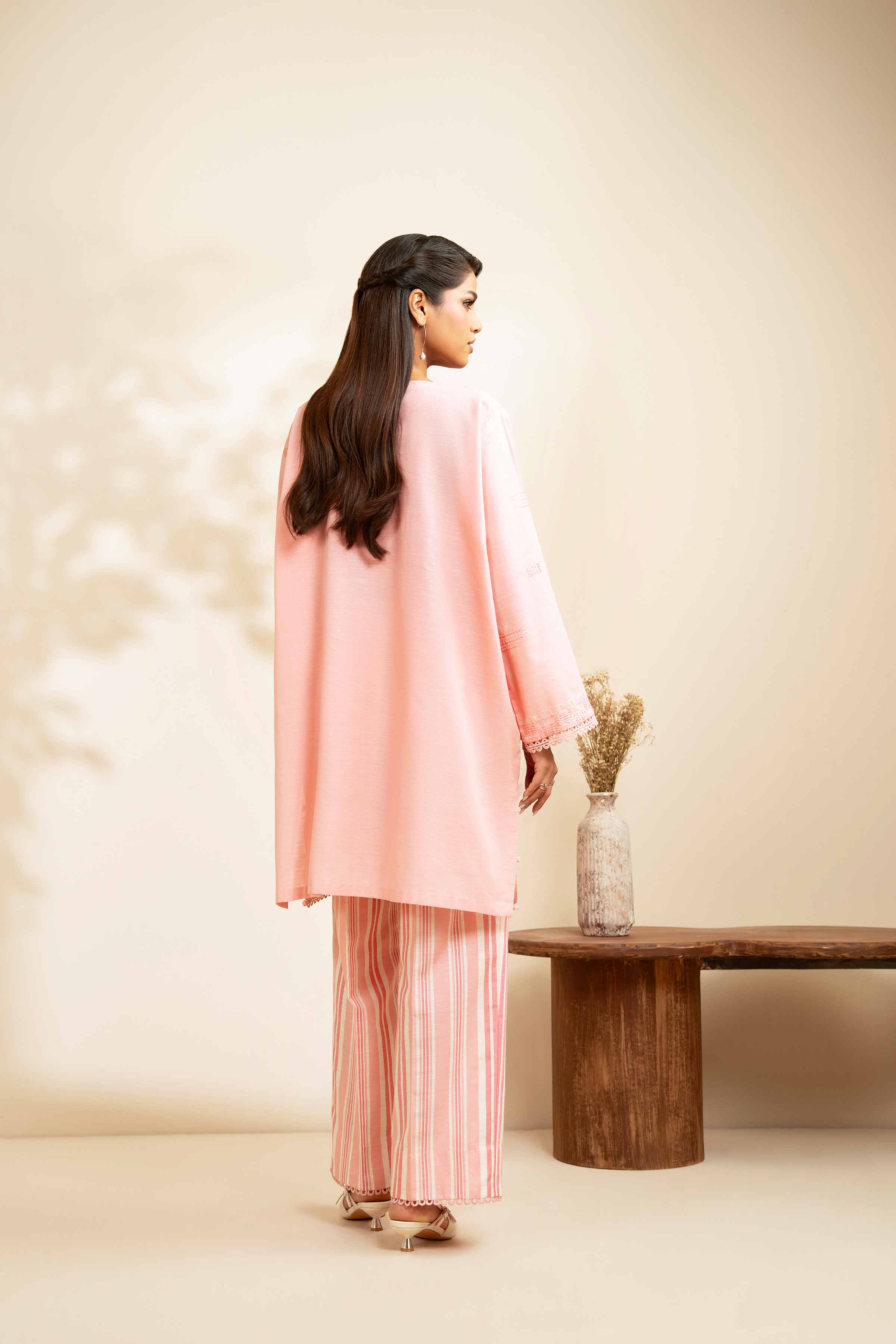 NISHATUAE - Peach Embroidered Khaddar 2-piece Unstitched Dress