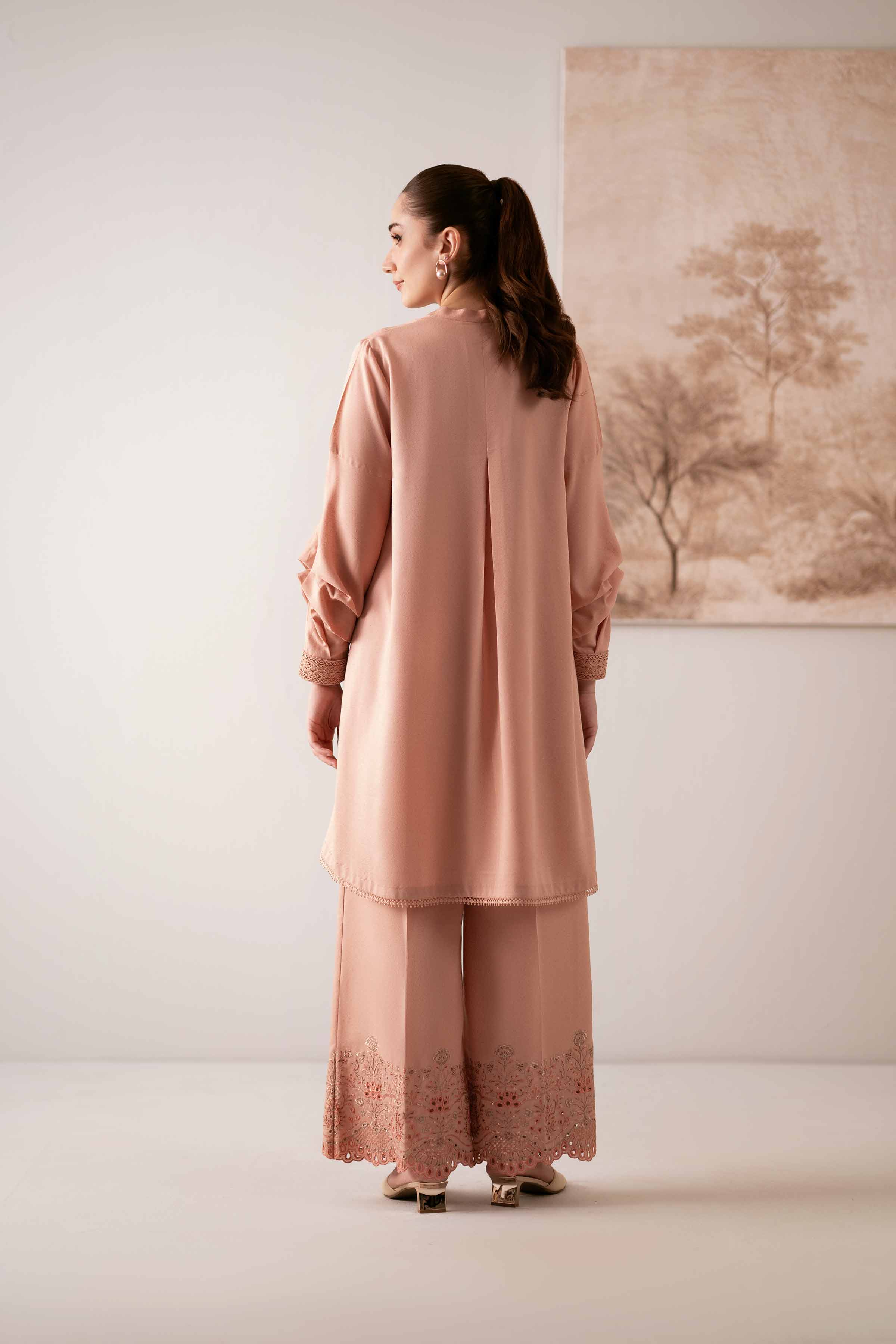 NISHATUAE - Light Peach & Purple Embroidered Karandi 2-piece Unstitched Dress