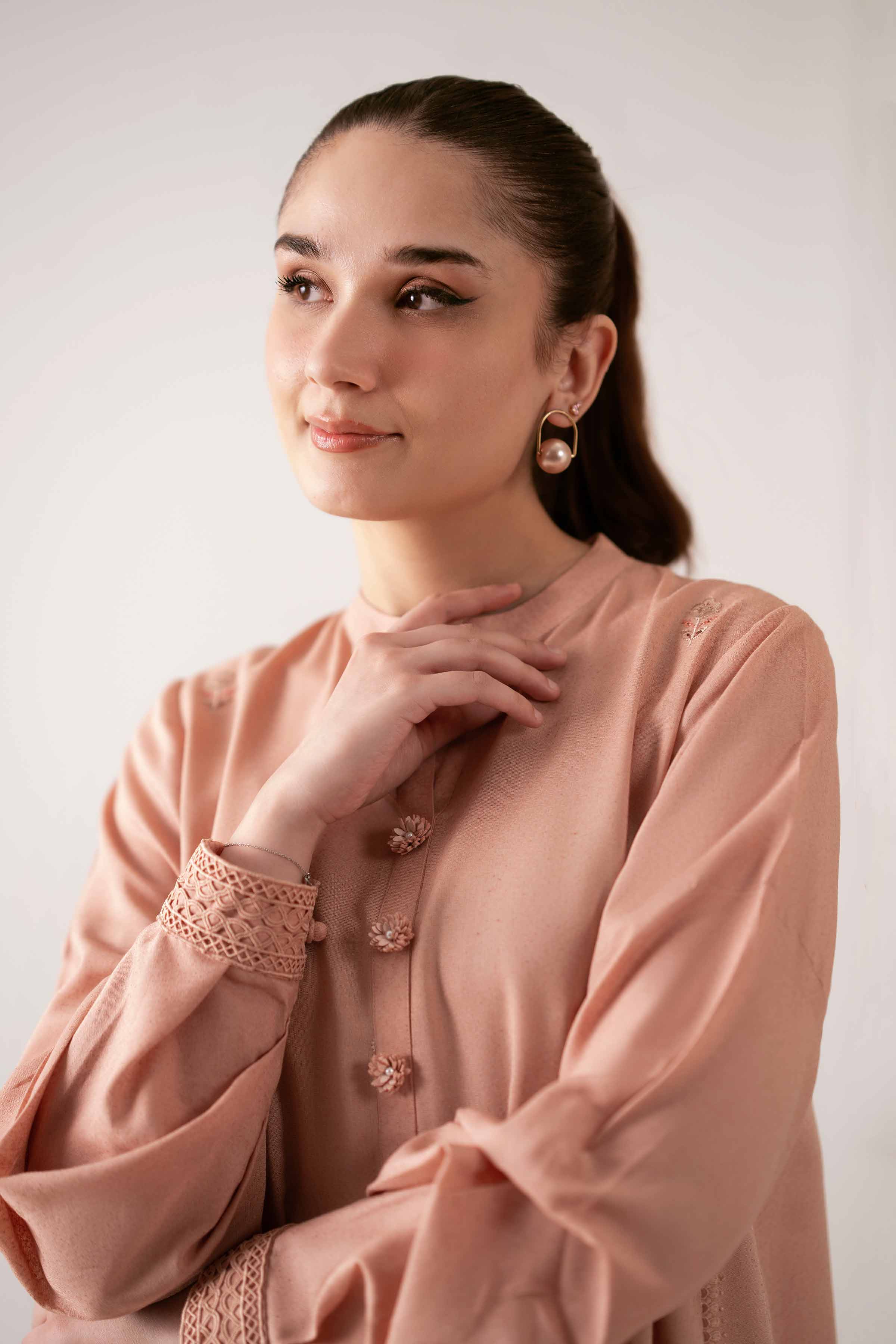 NISHATUAE - Light Peach & Purple Embroidered Karandi 2-piece Unstitched Dress