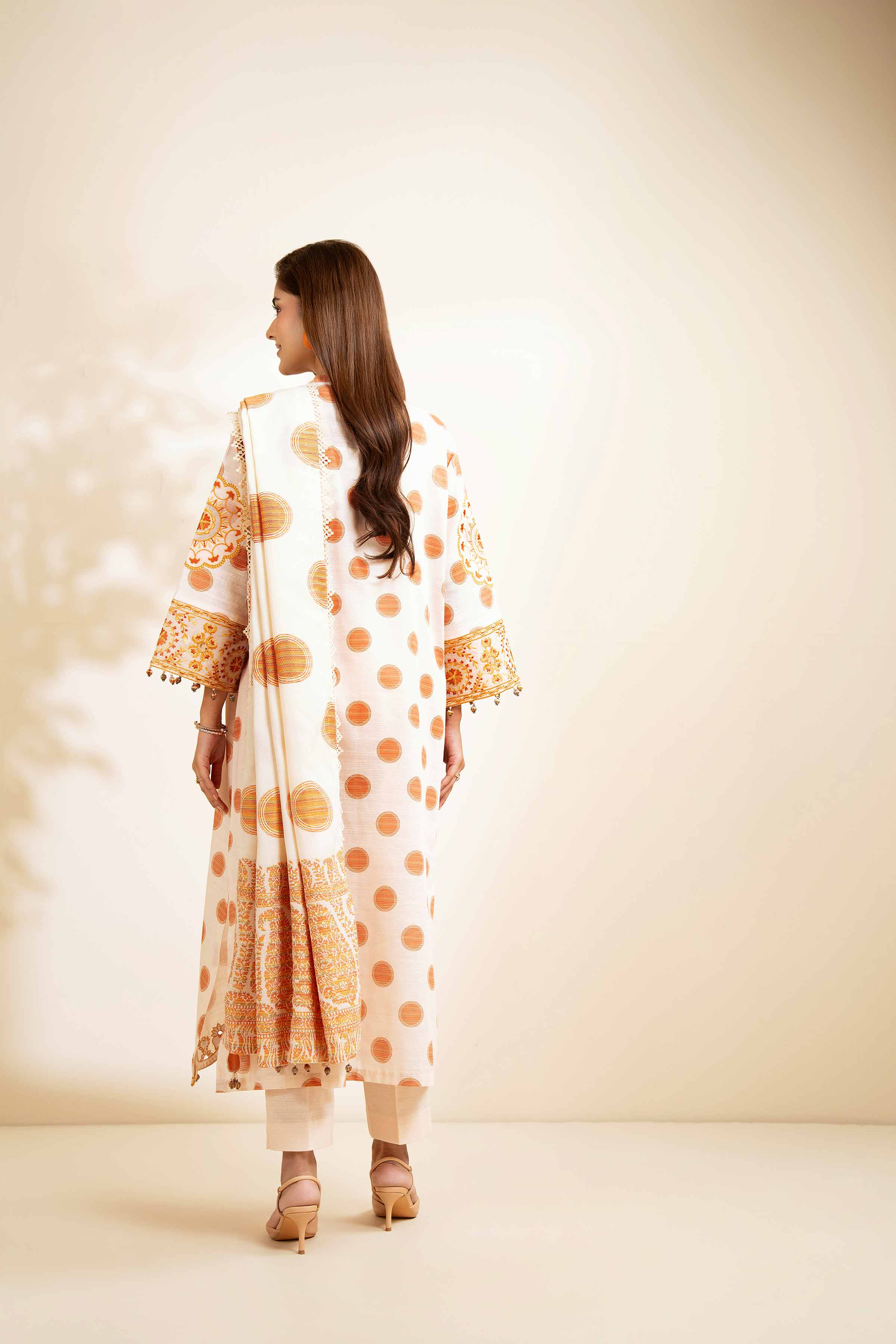 NISHATUAE - Peach Embroidered Khaddar 3-piece Unstitched Suit