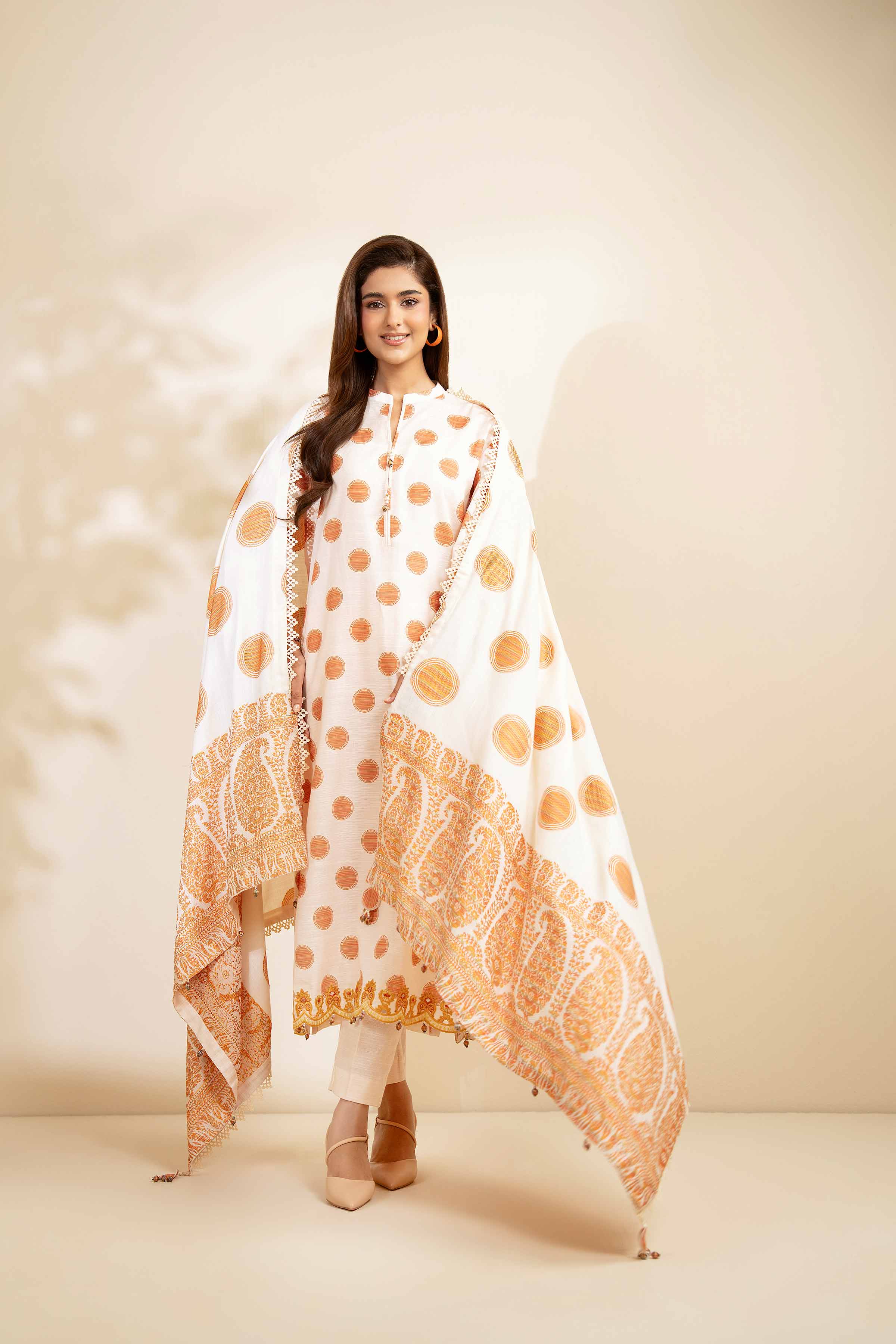 NISHATUAE - Peach Embroidered Khaddar 3-piece Unstitched Suit