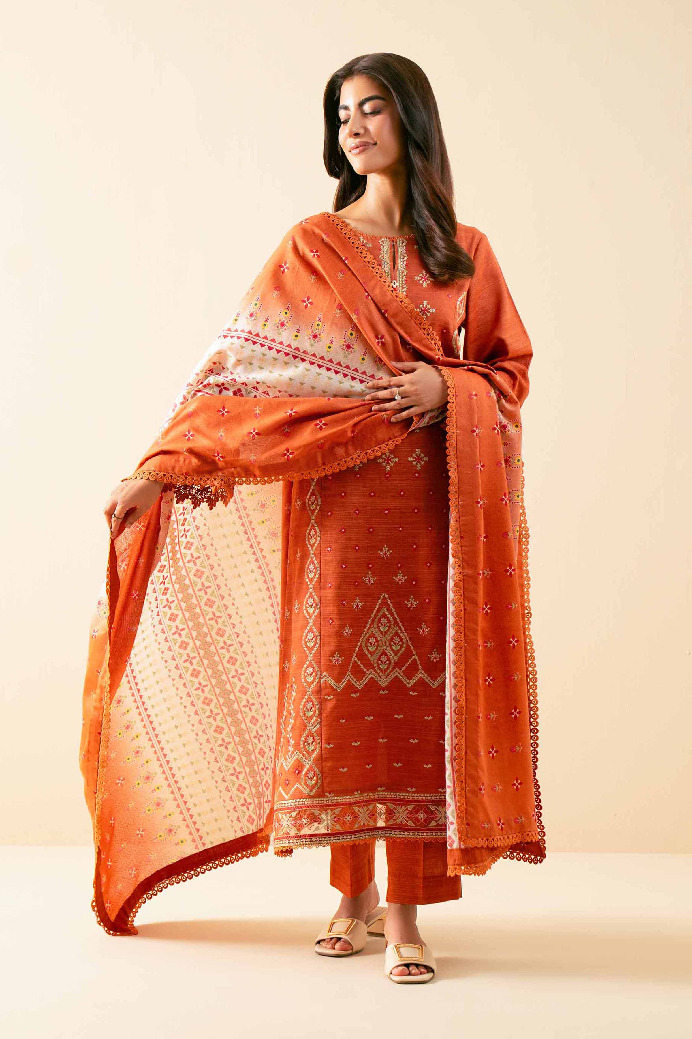 NISHATUAE - Rust Embroidered Khaddar 3-piece Unstitched Suit