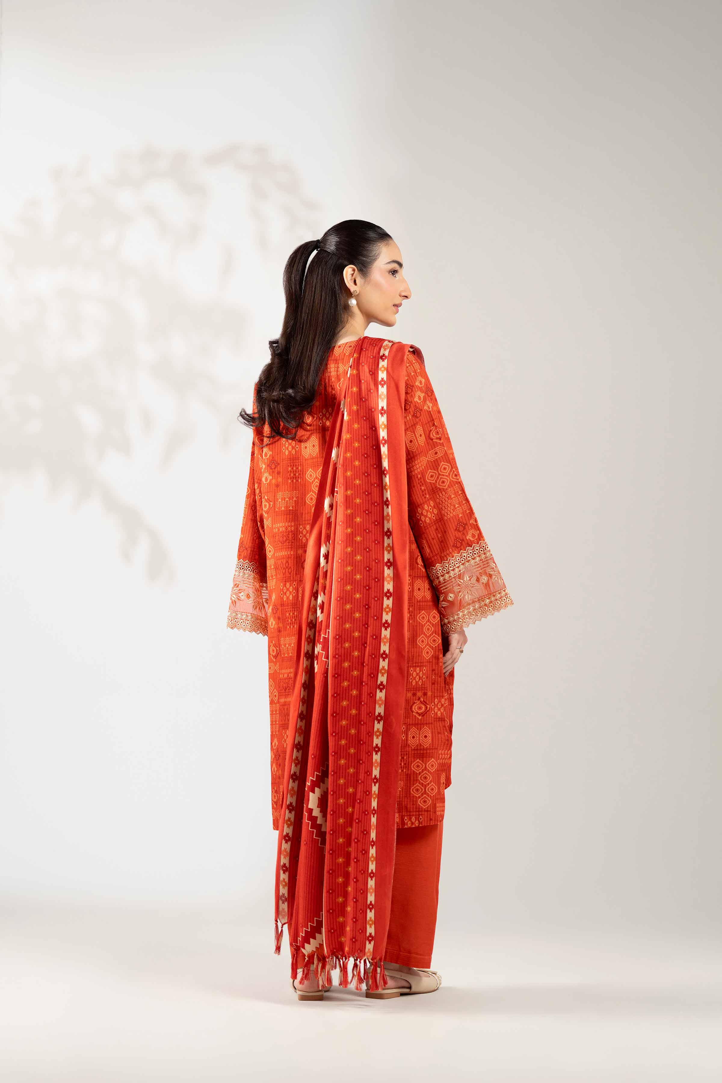 NISHATUAE - Rust Embroidered Khaddar 3-piece Unstitched Suit