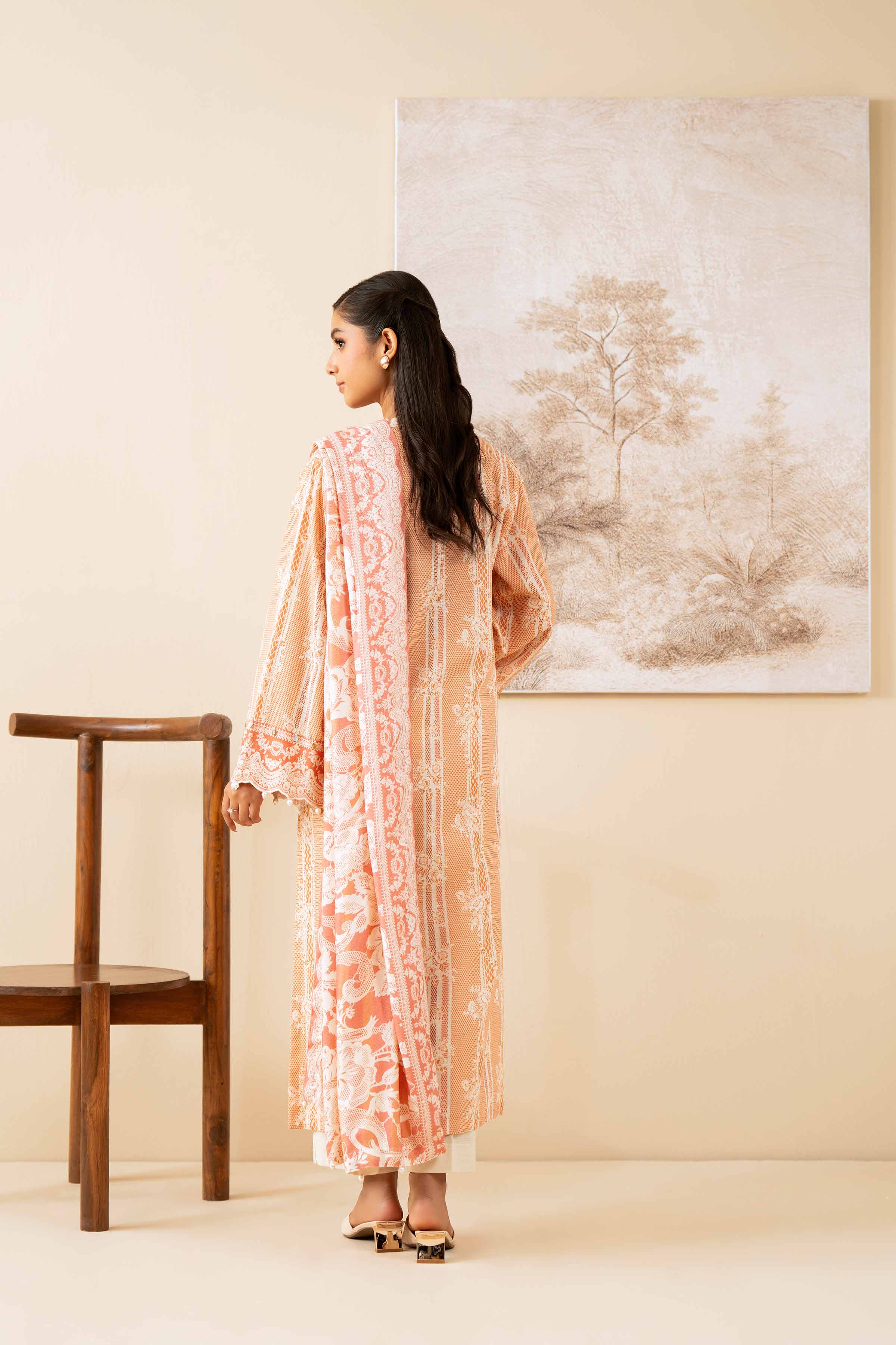 NISHATUAE - Peach Printed Khaddar 3-piece Unstitched Suit