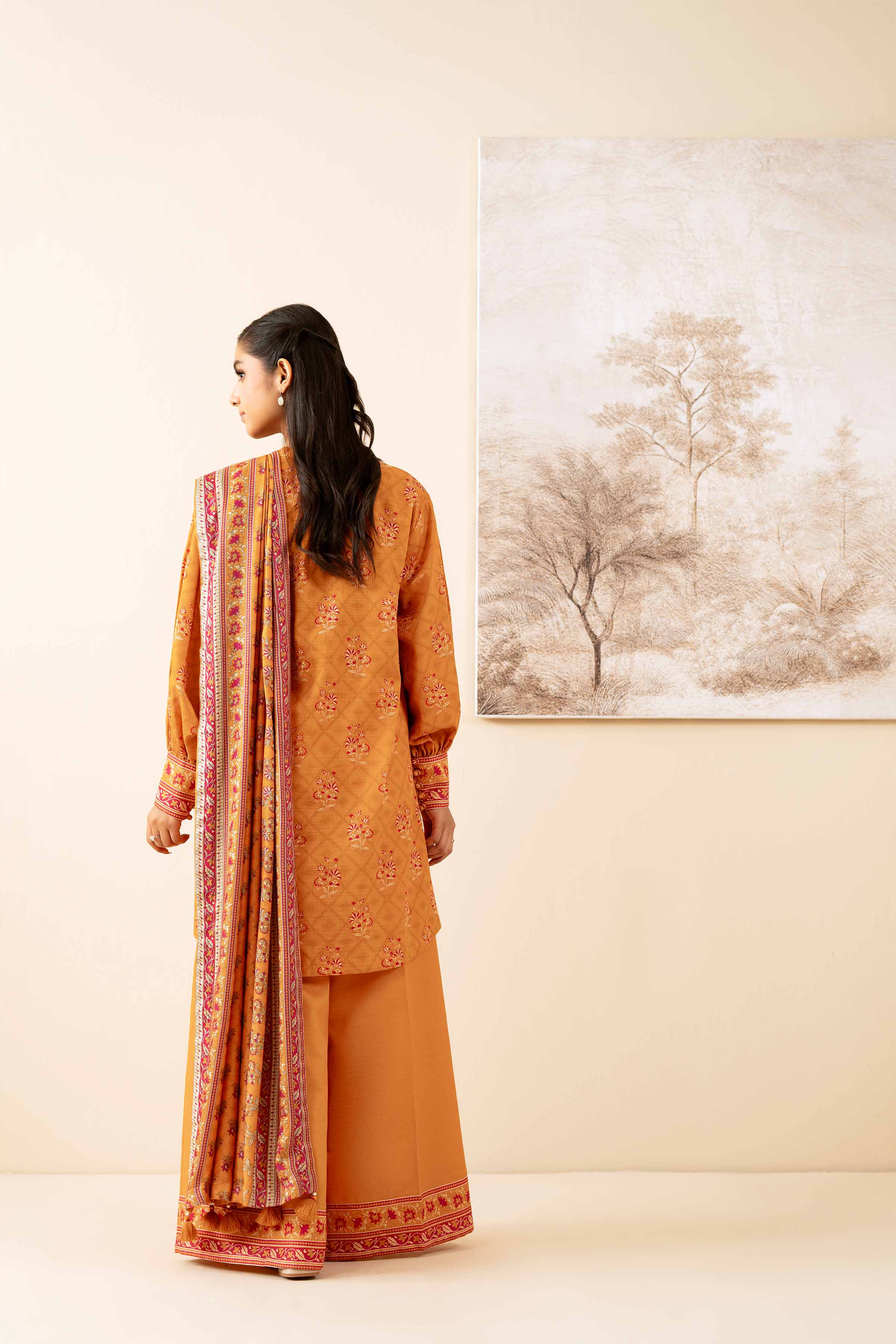 NISHATUAE - Orange Printed Khaddar 3-piece Unstitched Suit