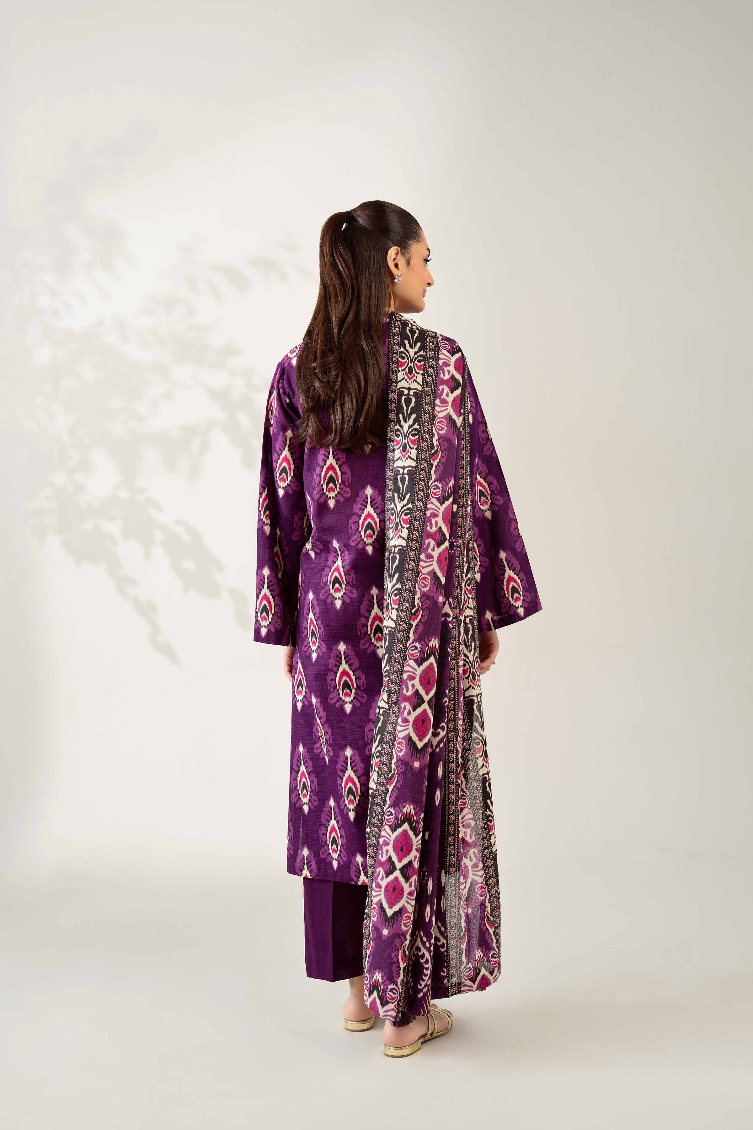 NISHATUAE - Purple Printed Khaddar 3-piece Unstitched Suit