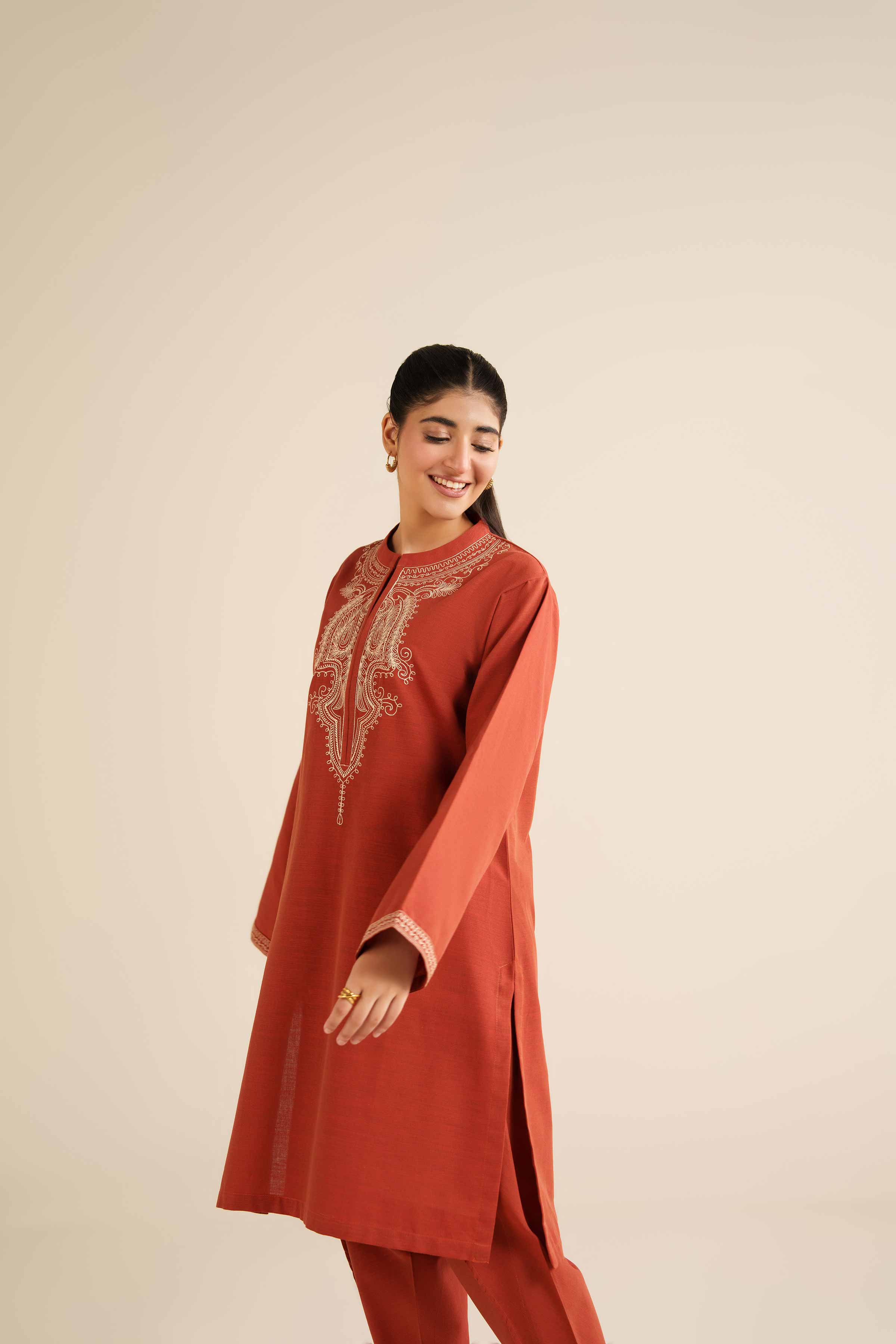 NISHATUAE - Orange Embroidered Khaddar 2-piece Ready to wear Dress