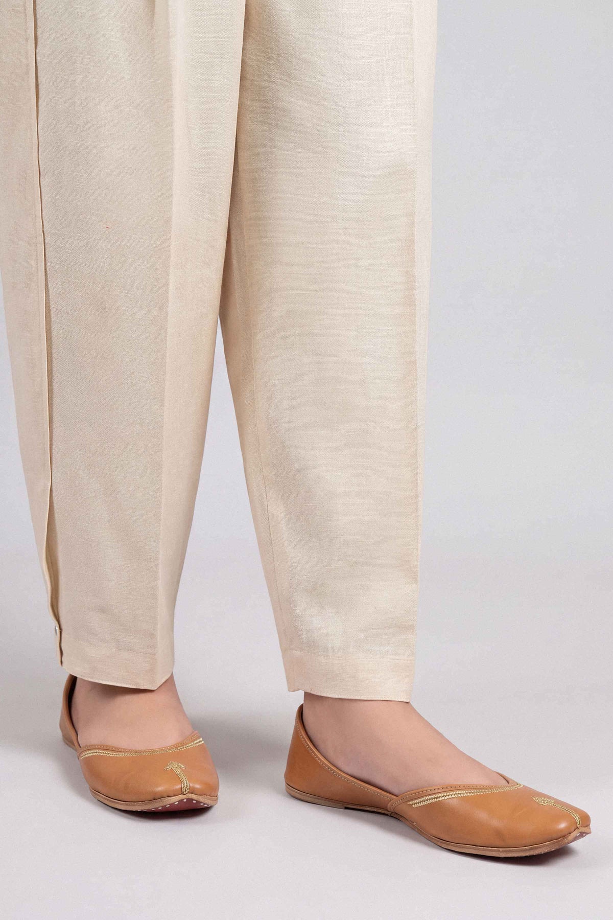 Beige Solid Pants in Karandi ready-to-wear