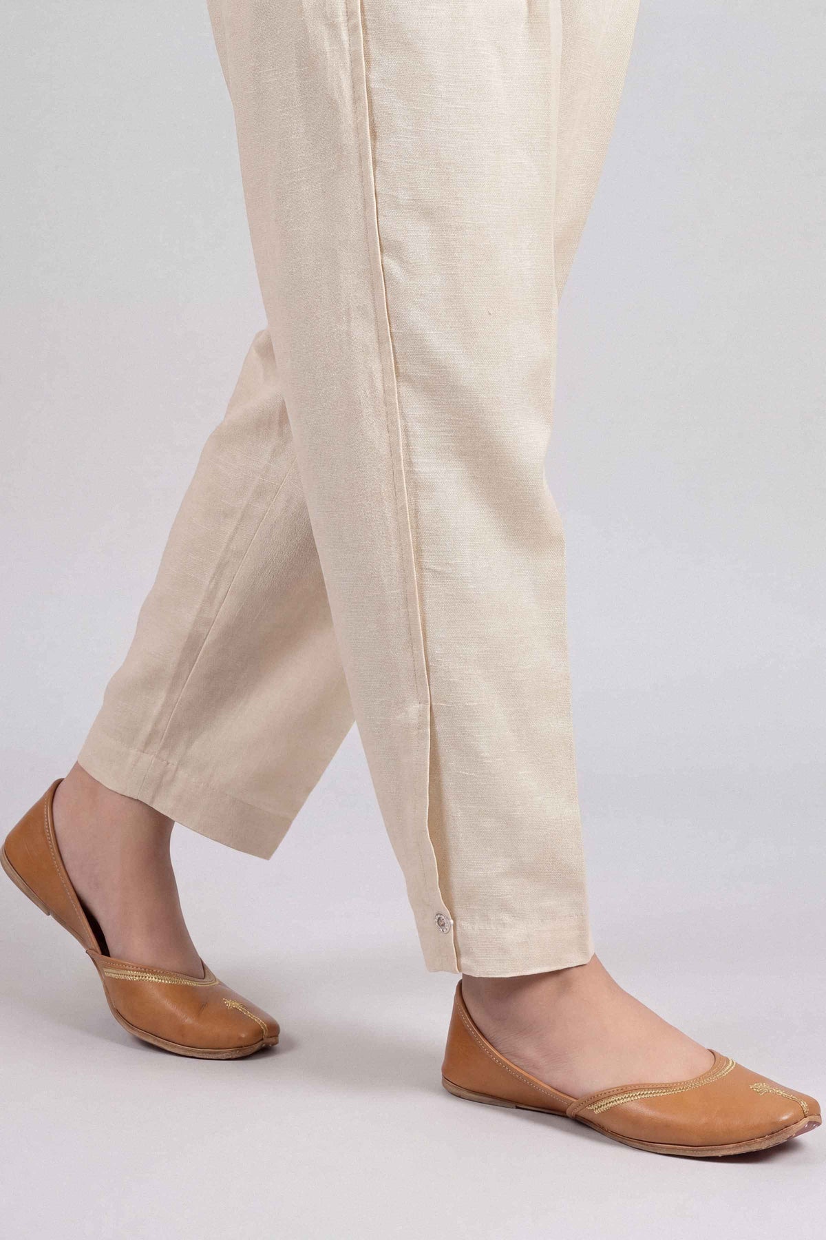 Beige Solid Pants in Karandi ready-to-wear