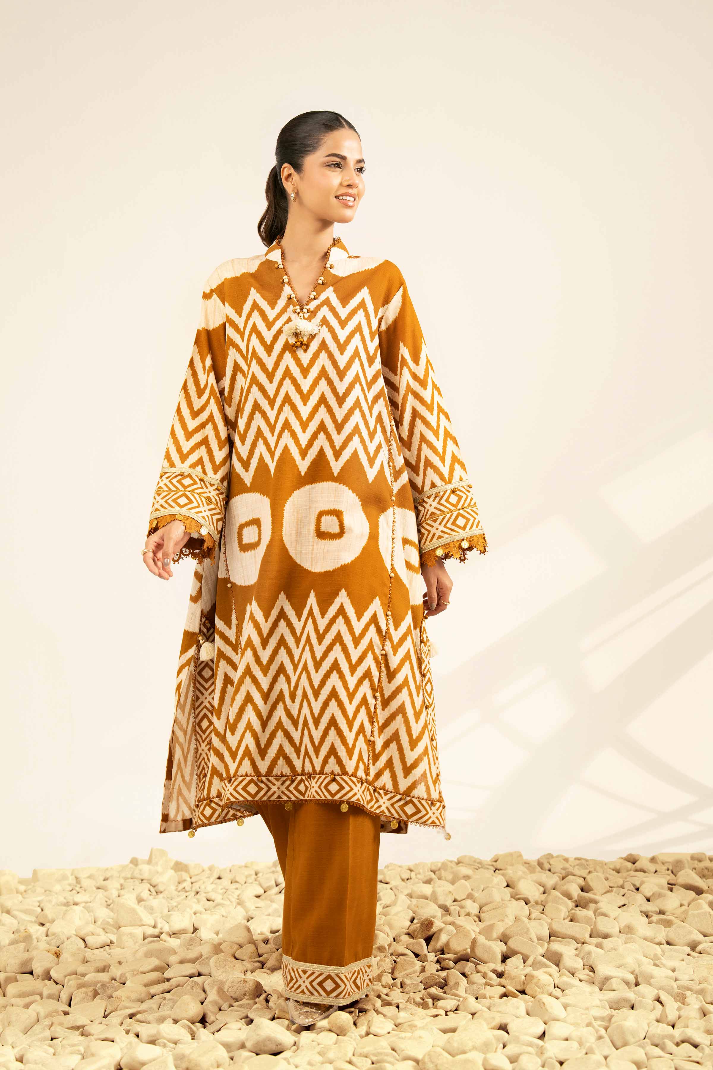 NISHATUAE - Brown Printed Khaddar 2-piece Unstitched Dress