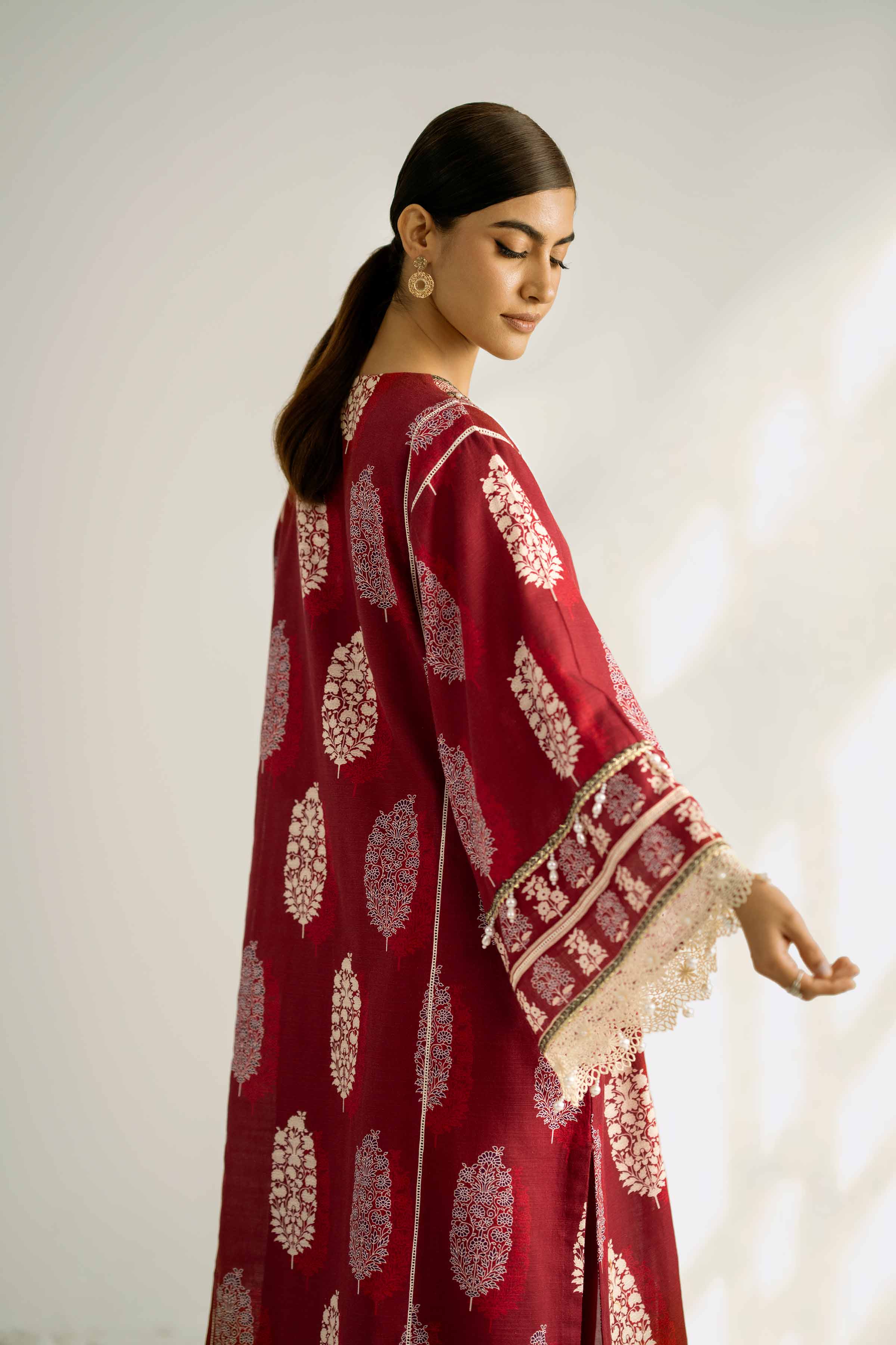 NISHATUAE - Maroon Printed Khaddar 2-piece Unstitched Dress