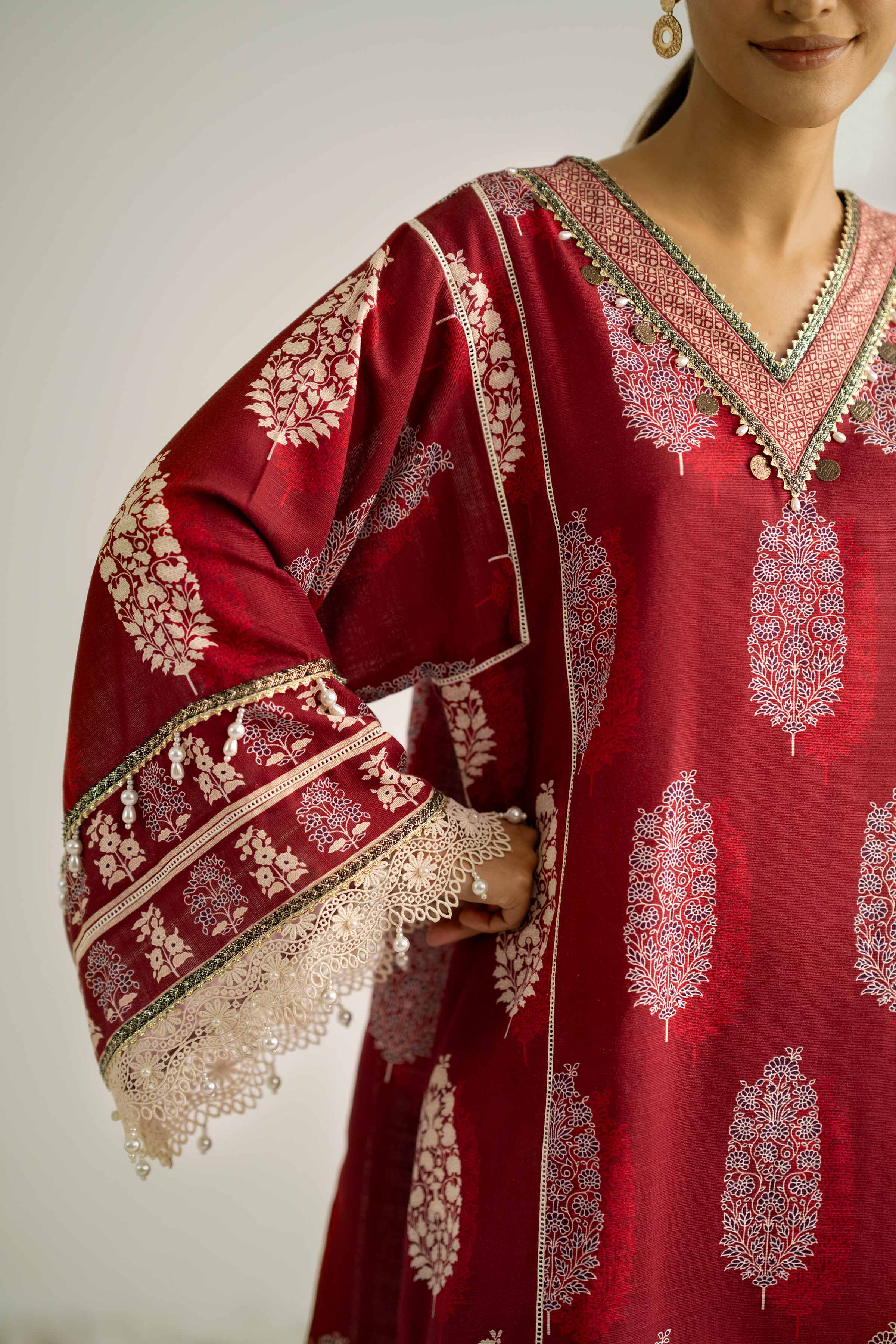 NISHATUAE - Maroon Printed Khaddar 2-piece Unstitched Dress