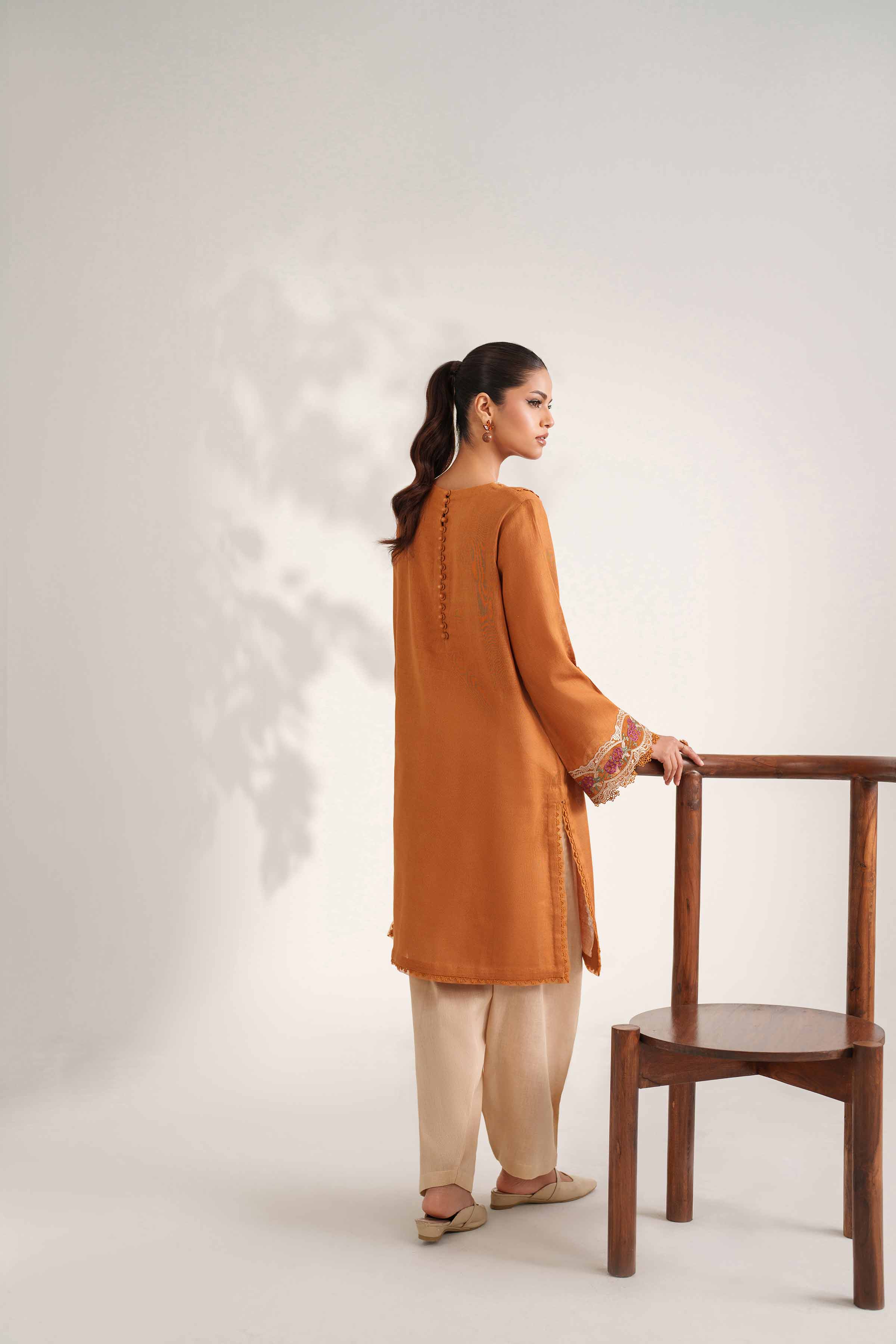 NISHATUAE - Ochre Embroidered Khaddar 2-piece Unstitched Dress