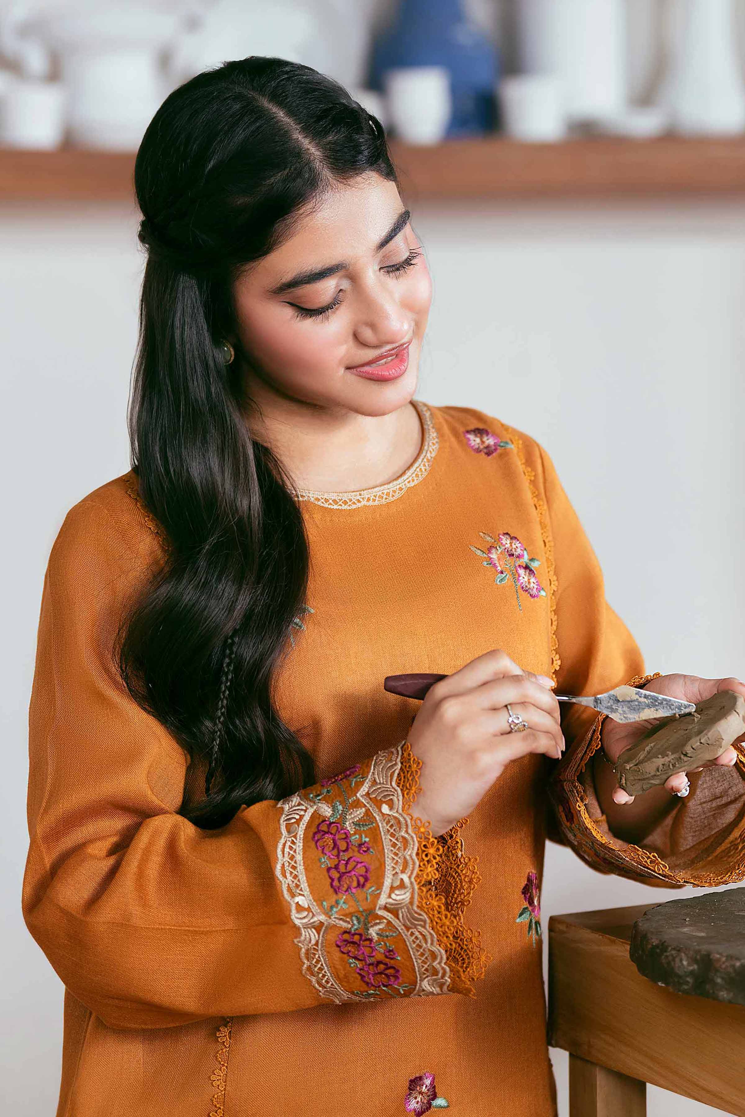 NISHATUAE - Ochre Embroidered Khaddar 2-piece Unstitched Dress