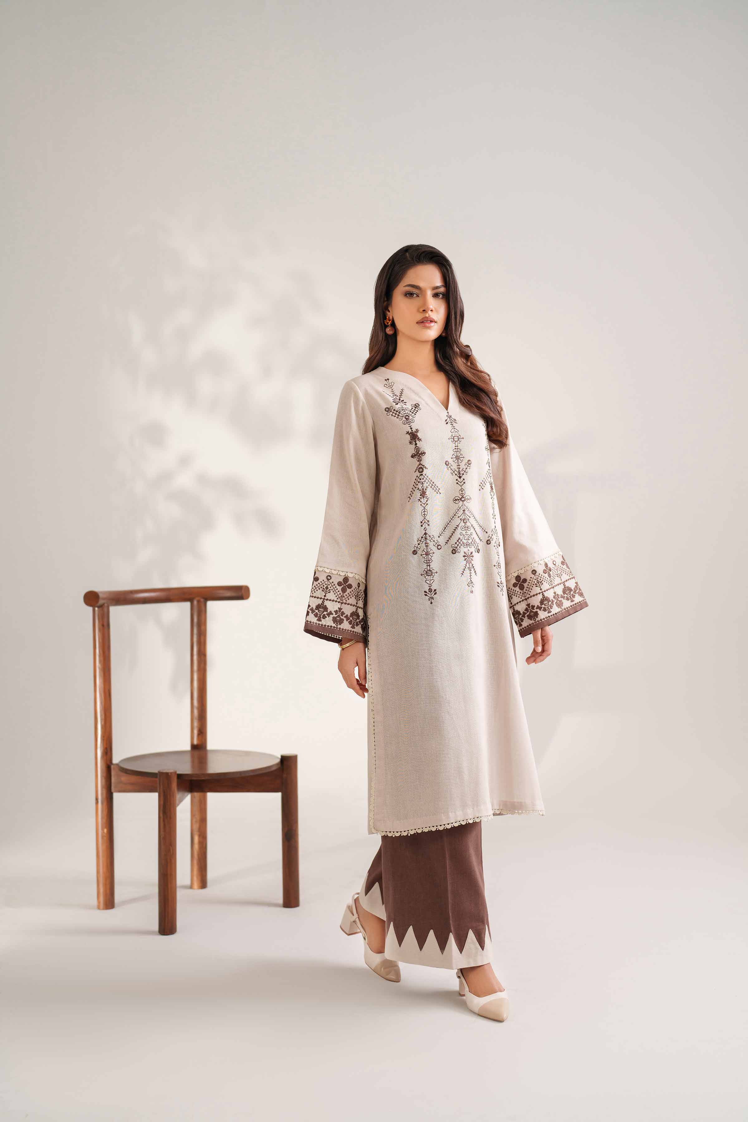 NISHATUAE - Off White Embroidered Khaddar 2-piece Unstitched Dress