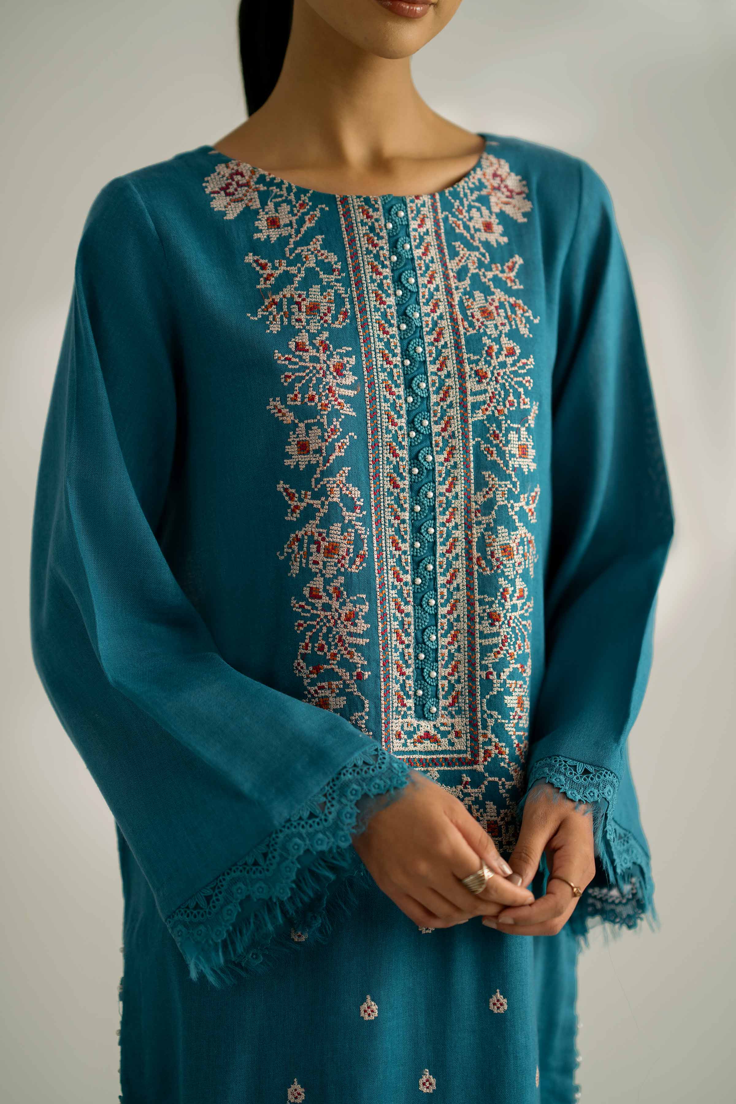 NISHATUAE - Teal Embroidered Khaddar 2-piece Unstitched Dress