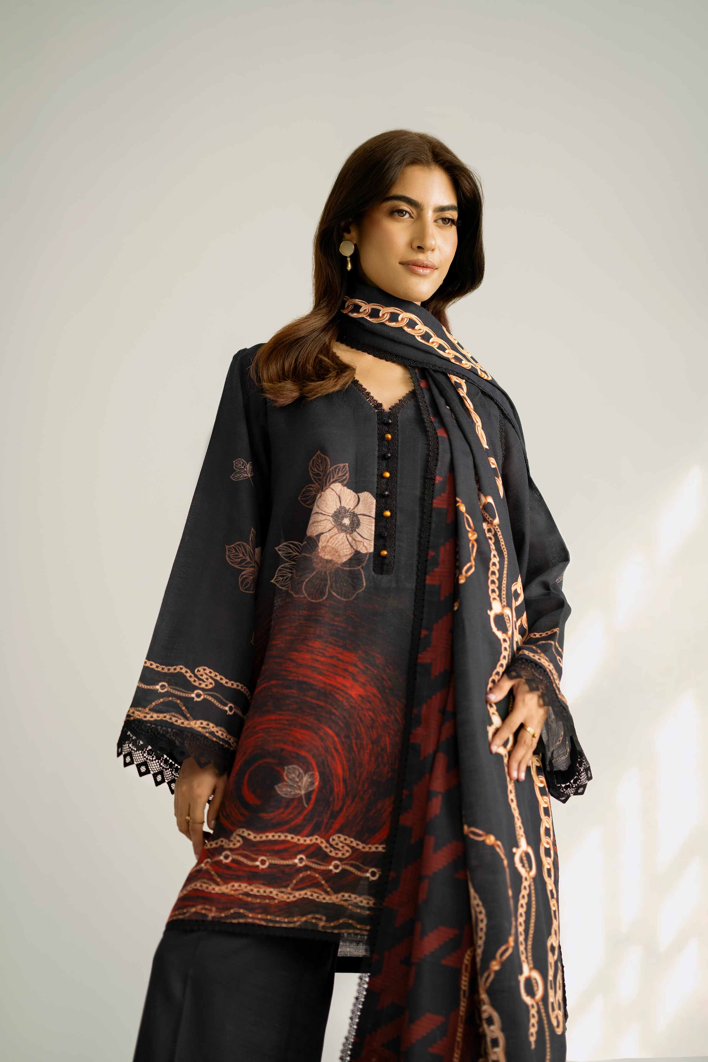 NISHATUAE - Black Printed Khaddar 3-piece Unstitched Suit
