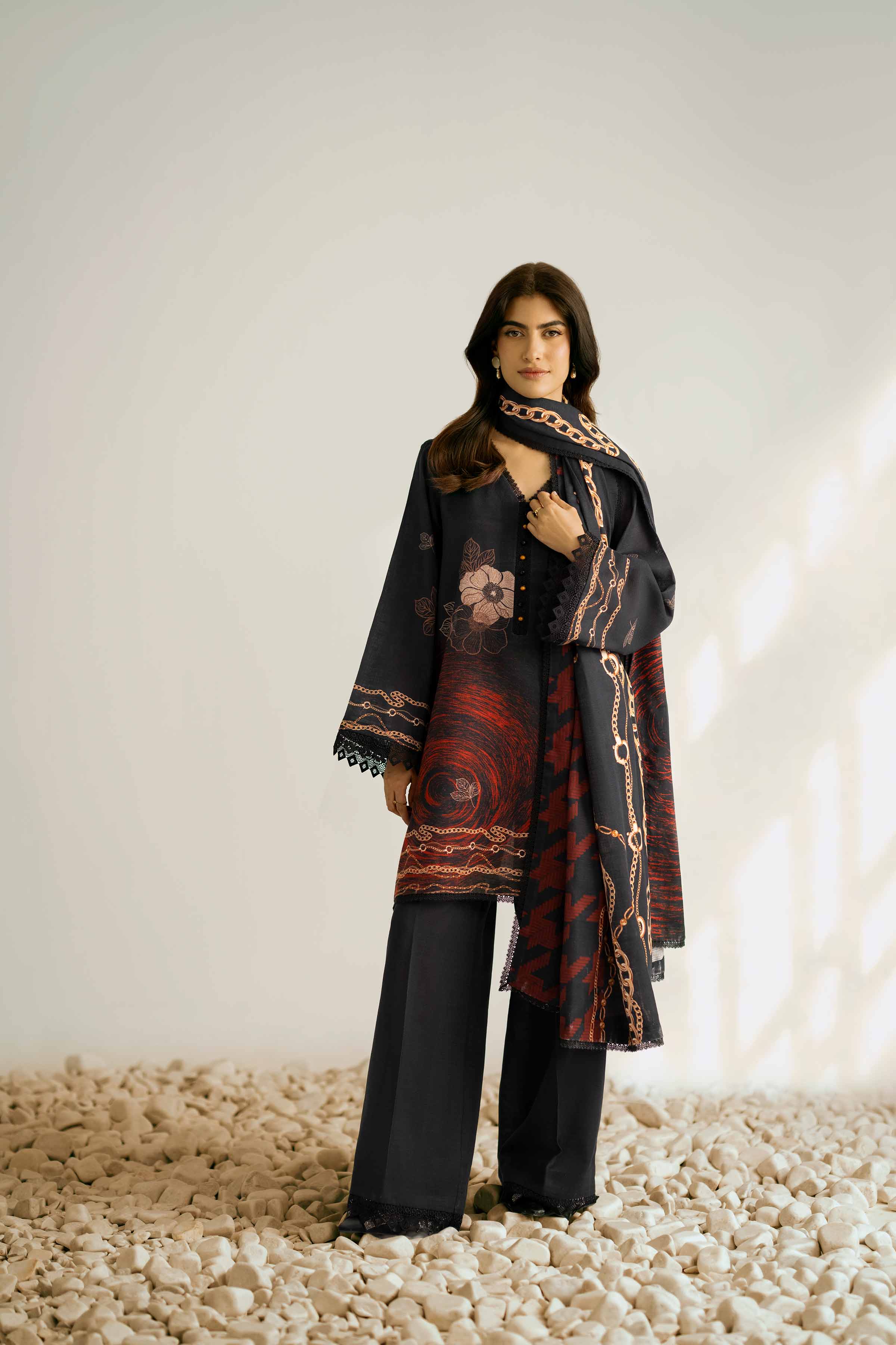 NISHATUAE - Black Printed Khaddar 3-piece Unstitched Suit