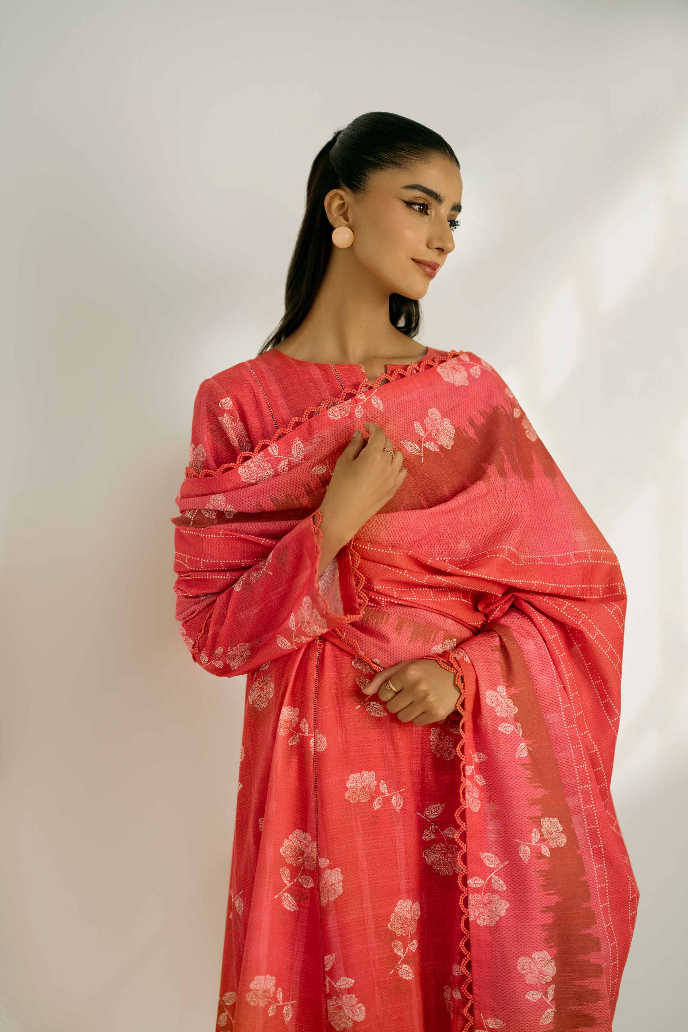 NISHATUAE - Coral Printed Khaddar 3-piece Unstitched Suit