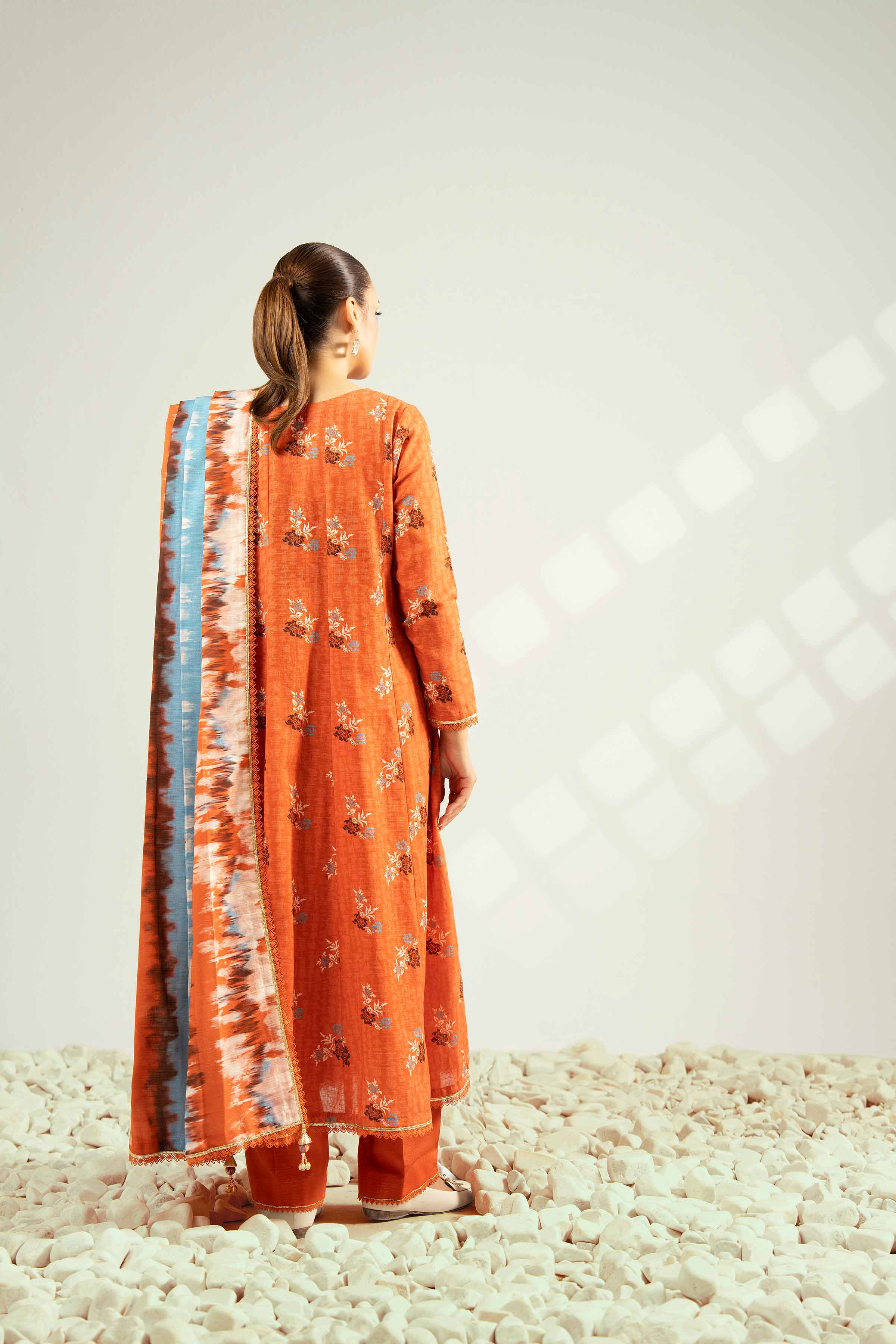 NISHATUAE - Orange Printed Khaddar 3-piece Unstitched Suit