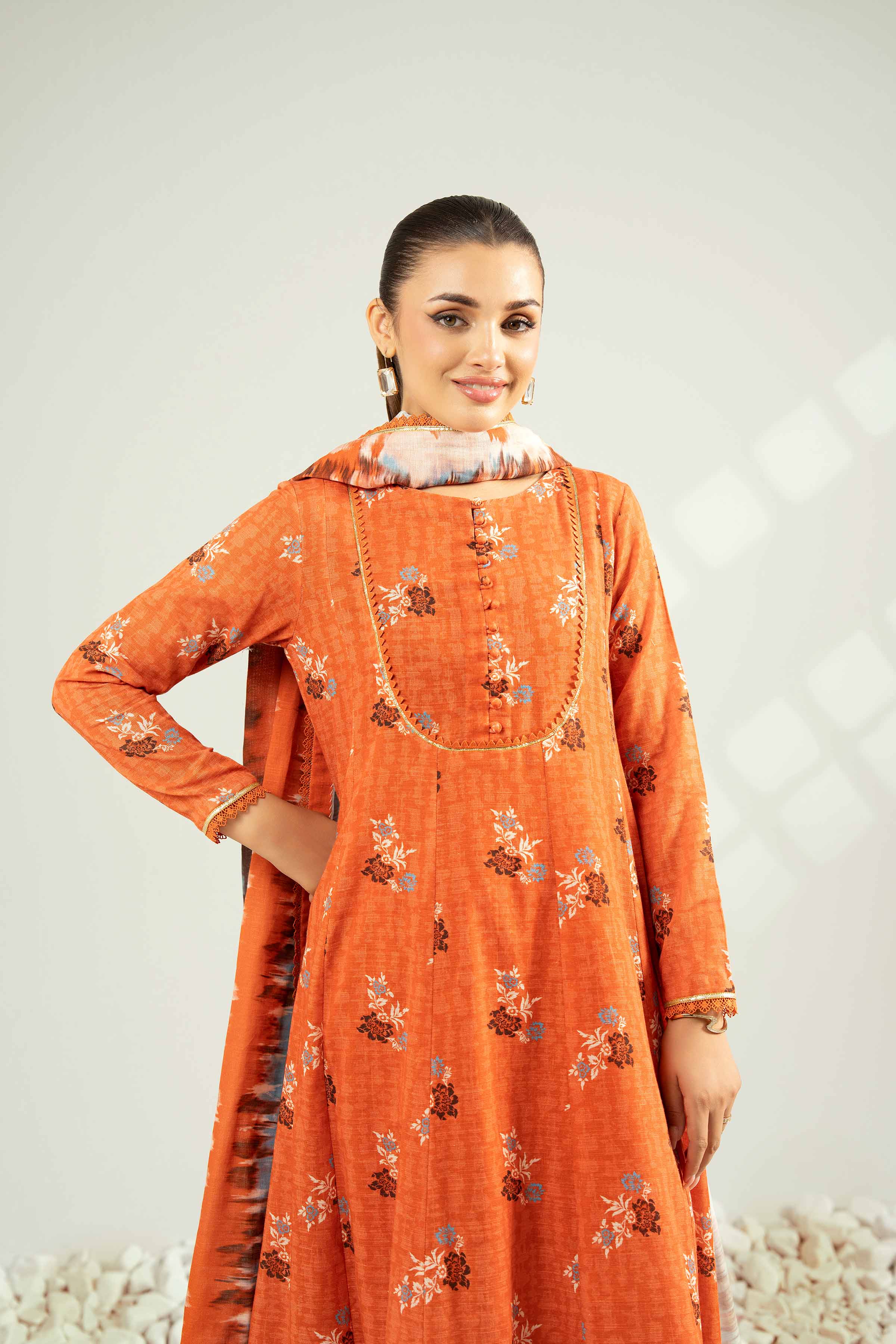 NISHATUAE - Orange Printed Khaddar 3-piece Unstitched Suit