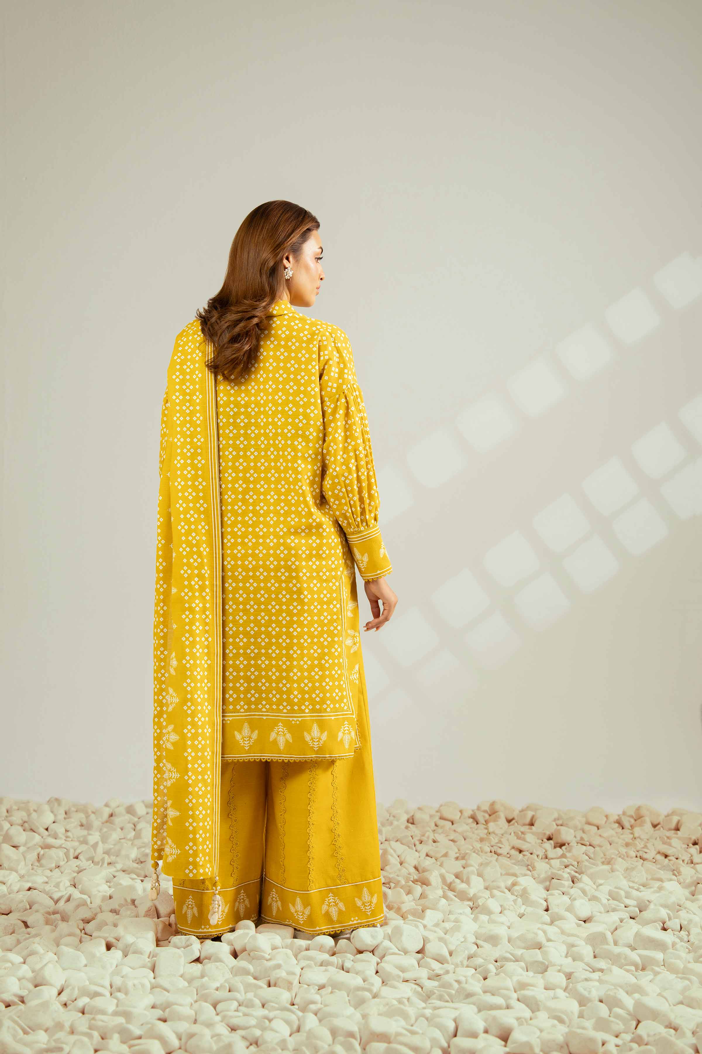 NISHATUAE - Yellow Printed Khaddar 3-piece Unstitched Suit