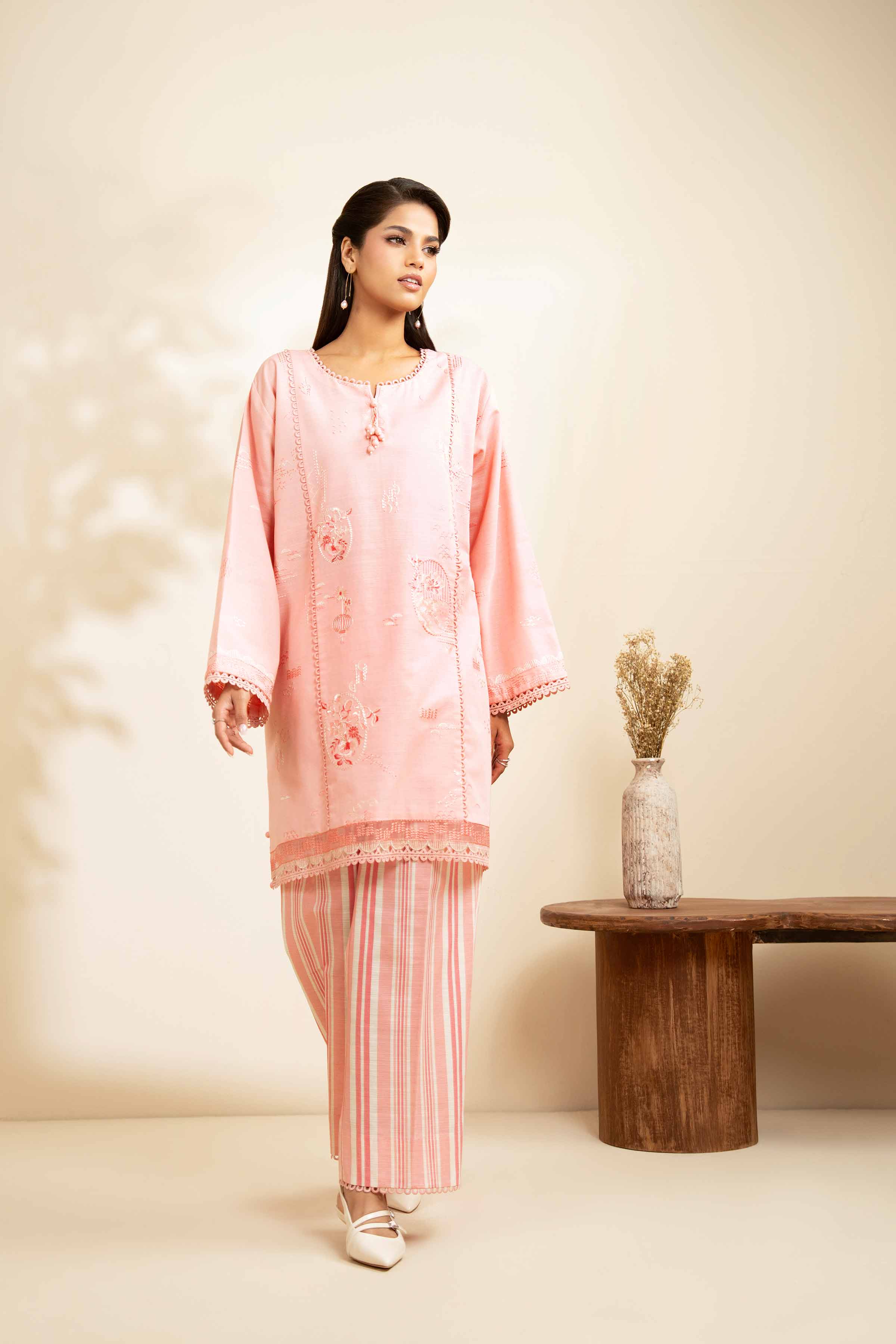 NISHATUAE - Peach Embroidered Khaddar 2-piece Unstitched Dress