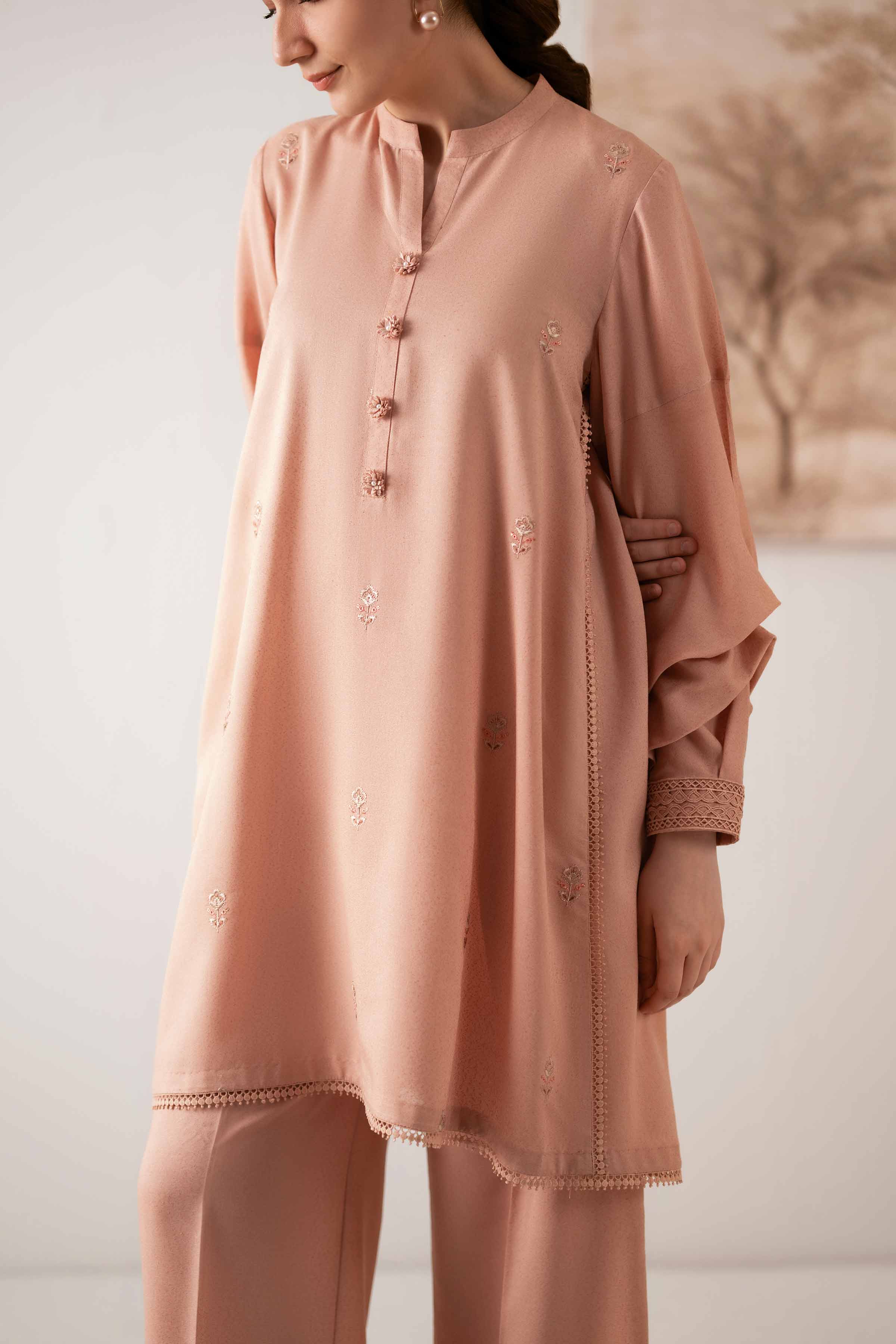 NISHATUAE - Light Peach & Purple Embroidered Karandi 2-piece Unstitched Dress