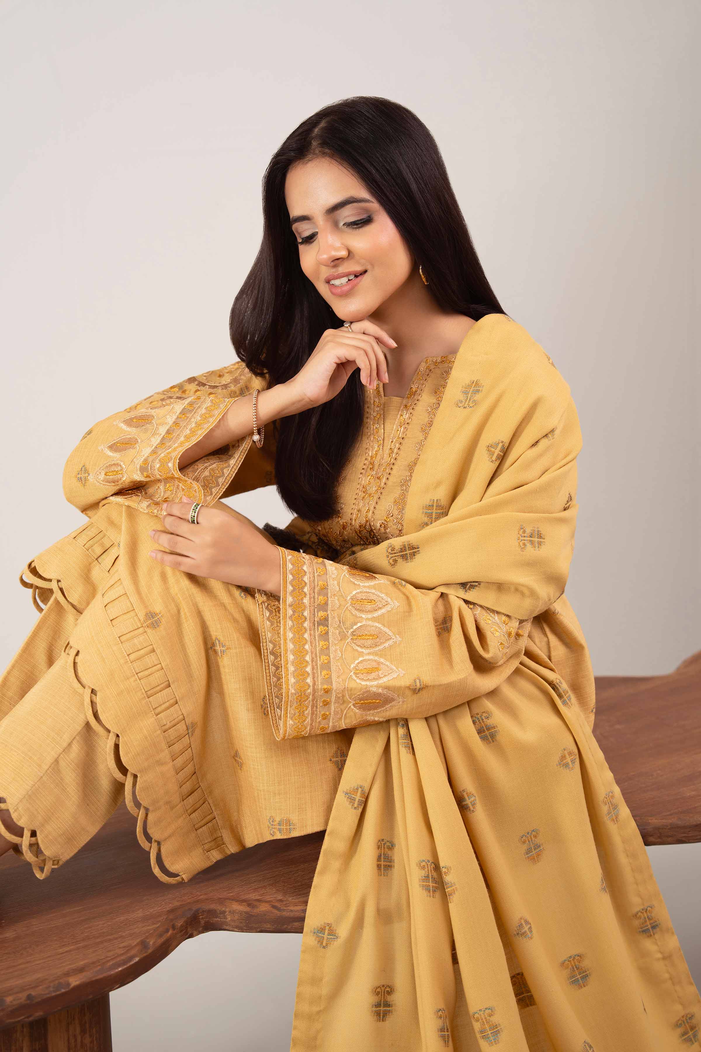 NISHATUAE - Mustard Embroidered Khaddar 3-piece Unstitched Suit