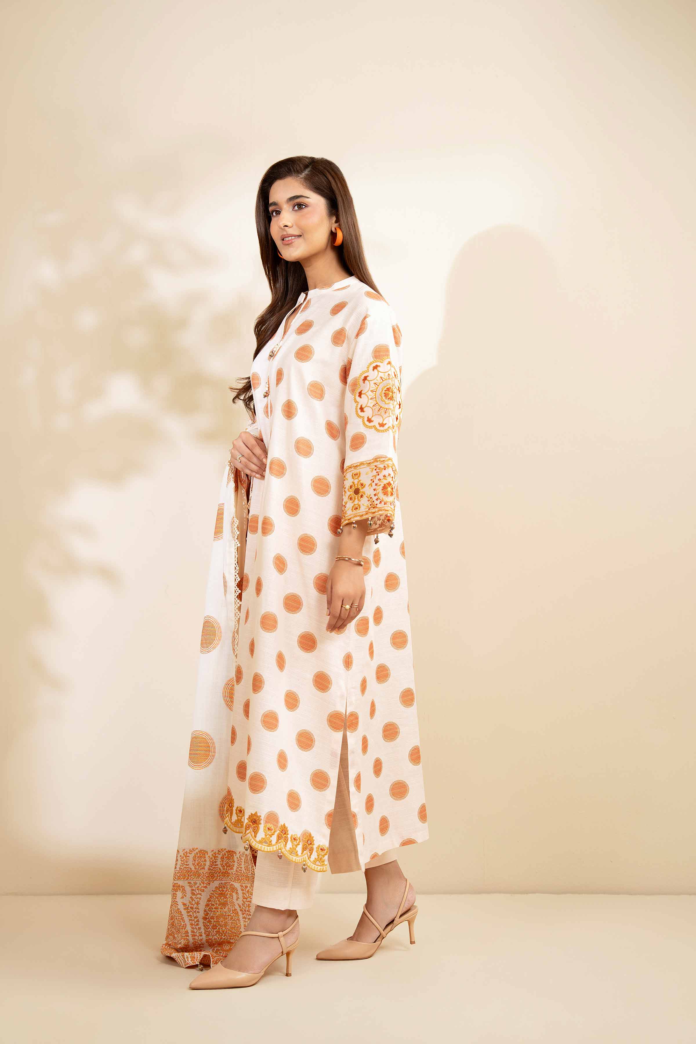 NISHATUAE - Peach Embroidered Khaddar 3-piece Unstitched Suit