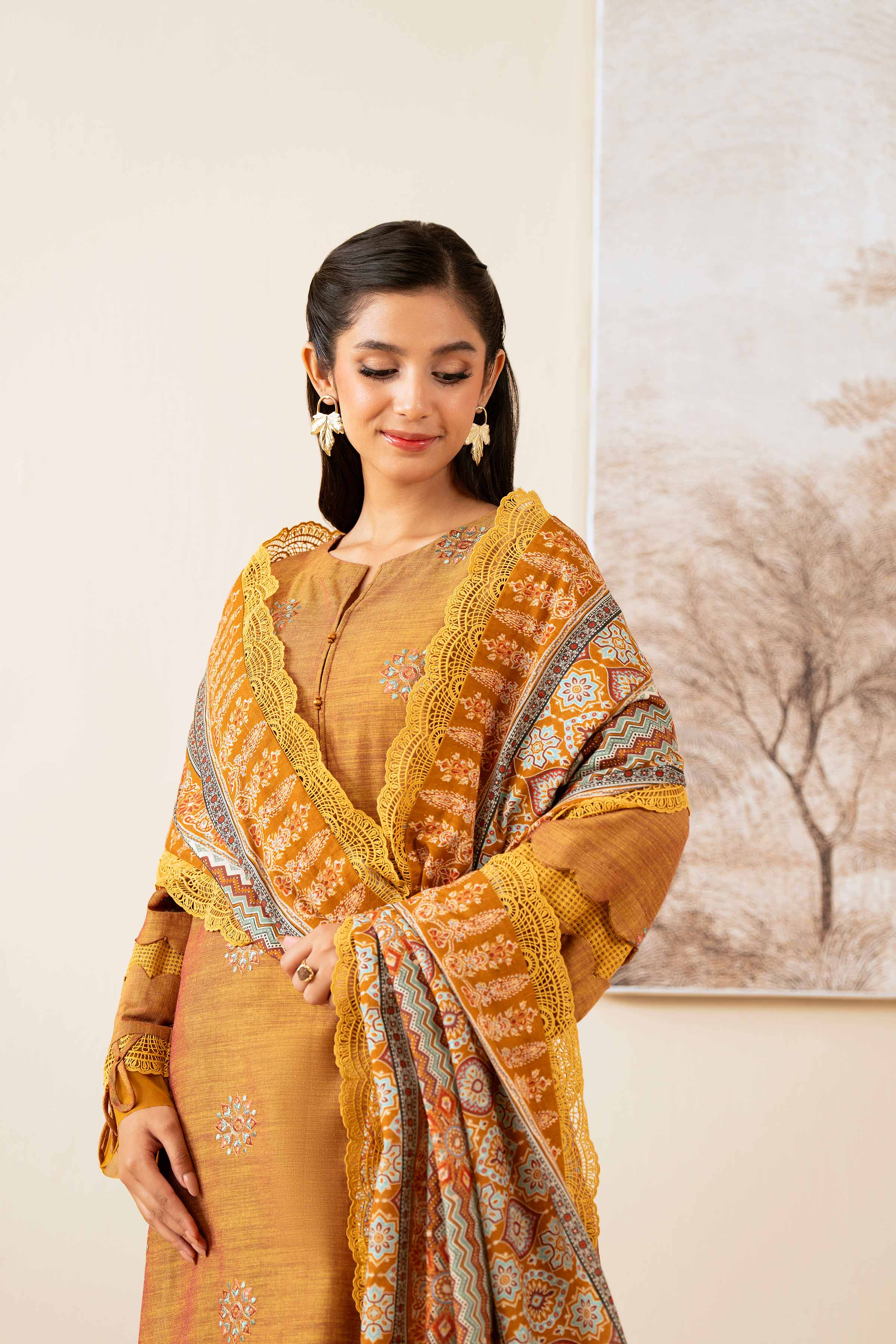 NISHATUAE - Mustard Embroidered Khaddar 3-piece Unstitched Suit