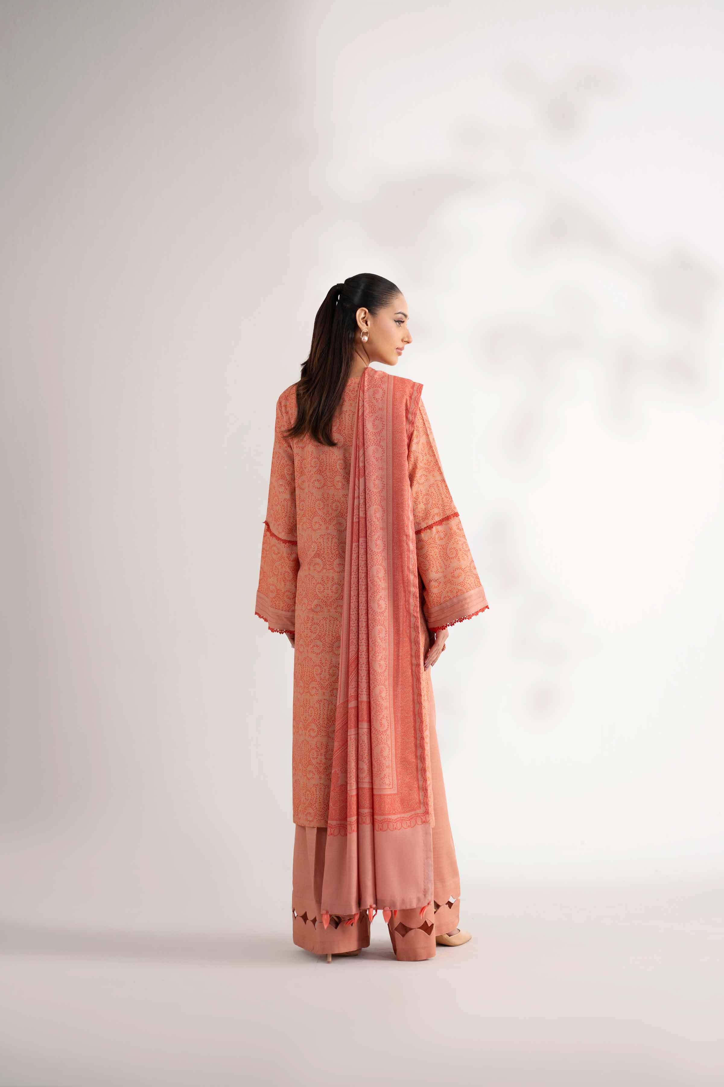 NISHATUAE - Peach Embroidered Khaddar 3-piece Unstitched Suit