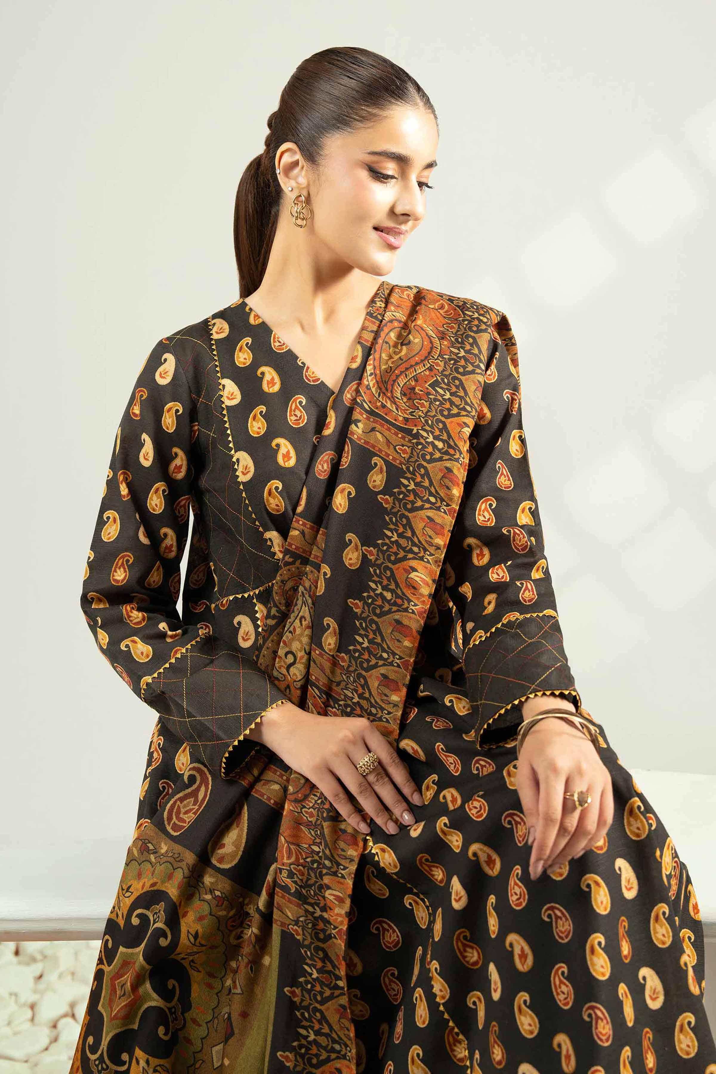 NISHATUAE - Black Printed Khaddar 3-piece Unstitched Suit