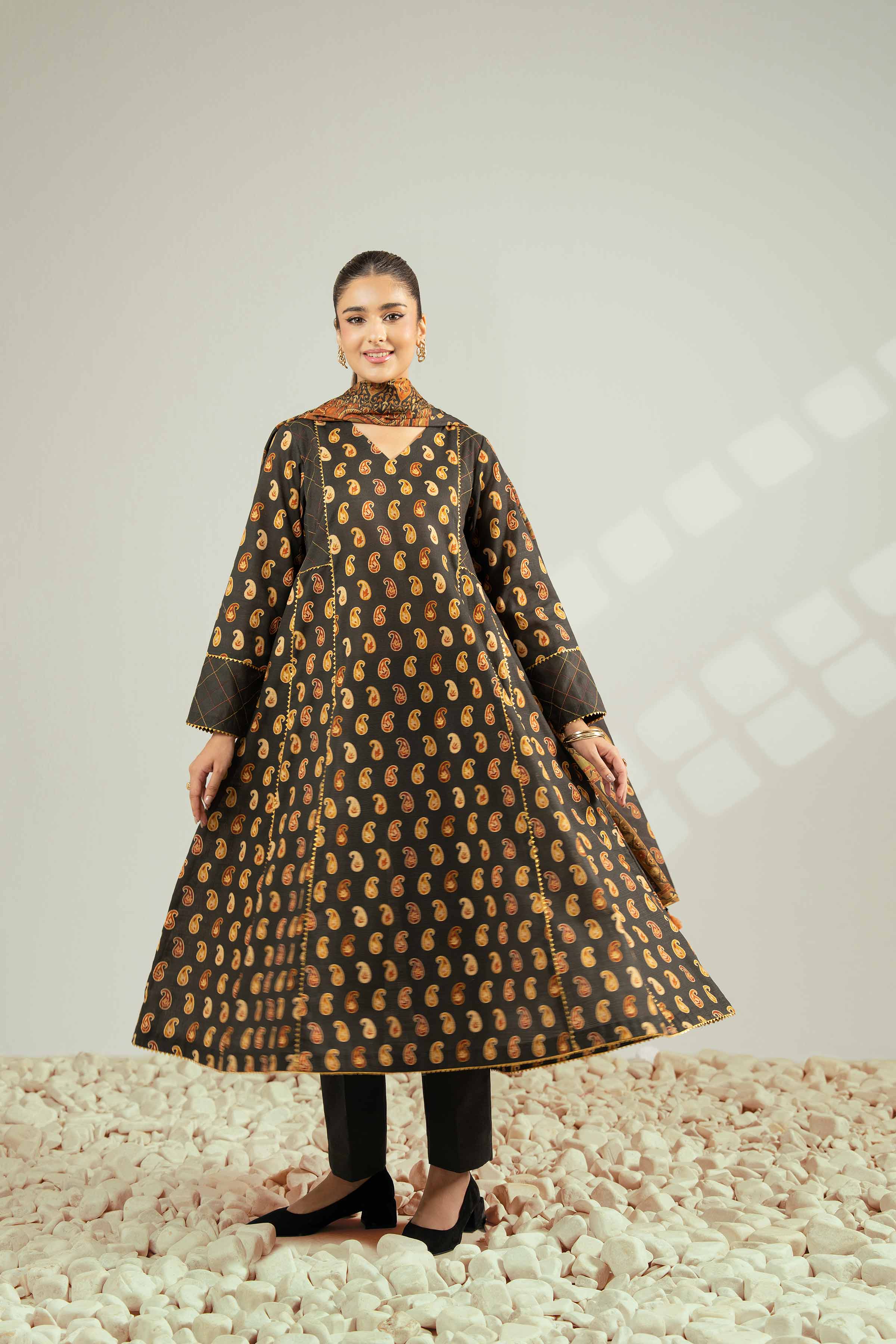 NISHATUAE - Black Printed Khaddar 3-piece Unstitched Suit