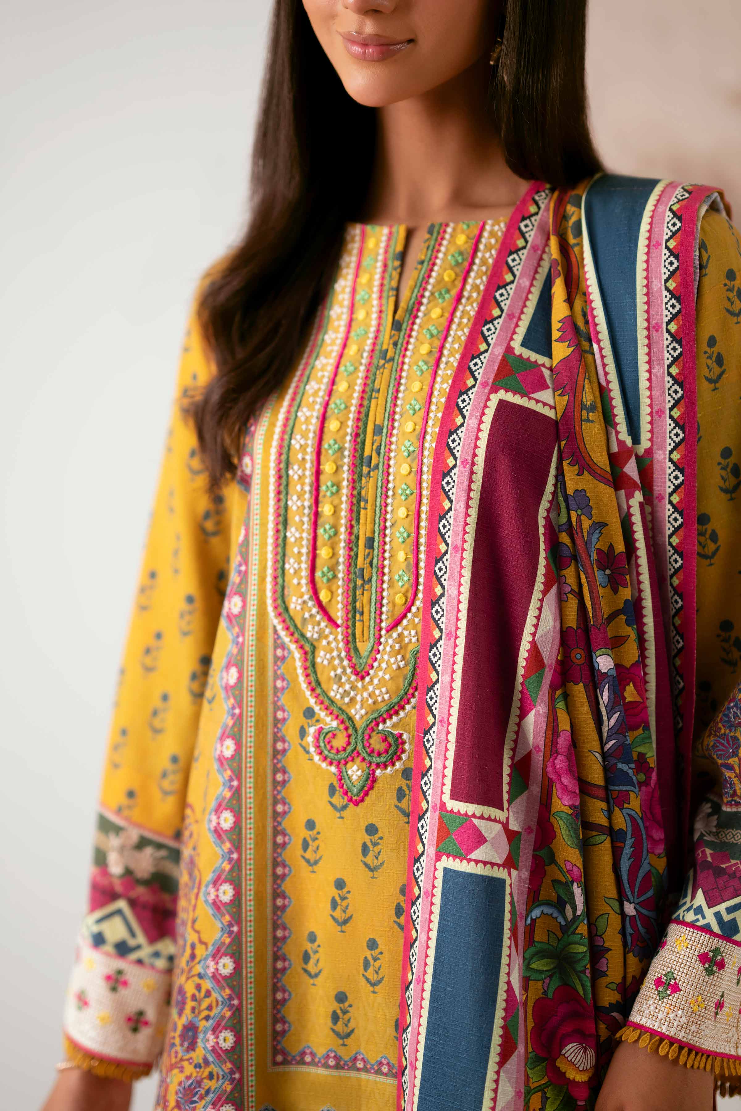 NISHATUAE - Mustard Embroidered Jacquard 3-piece Unstitched Suit
