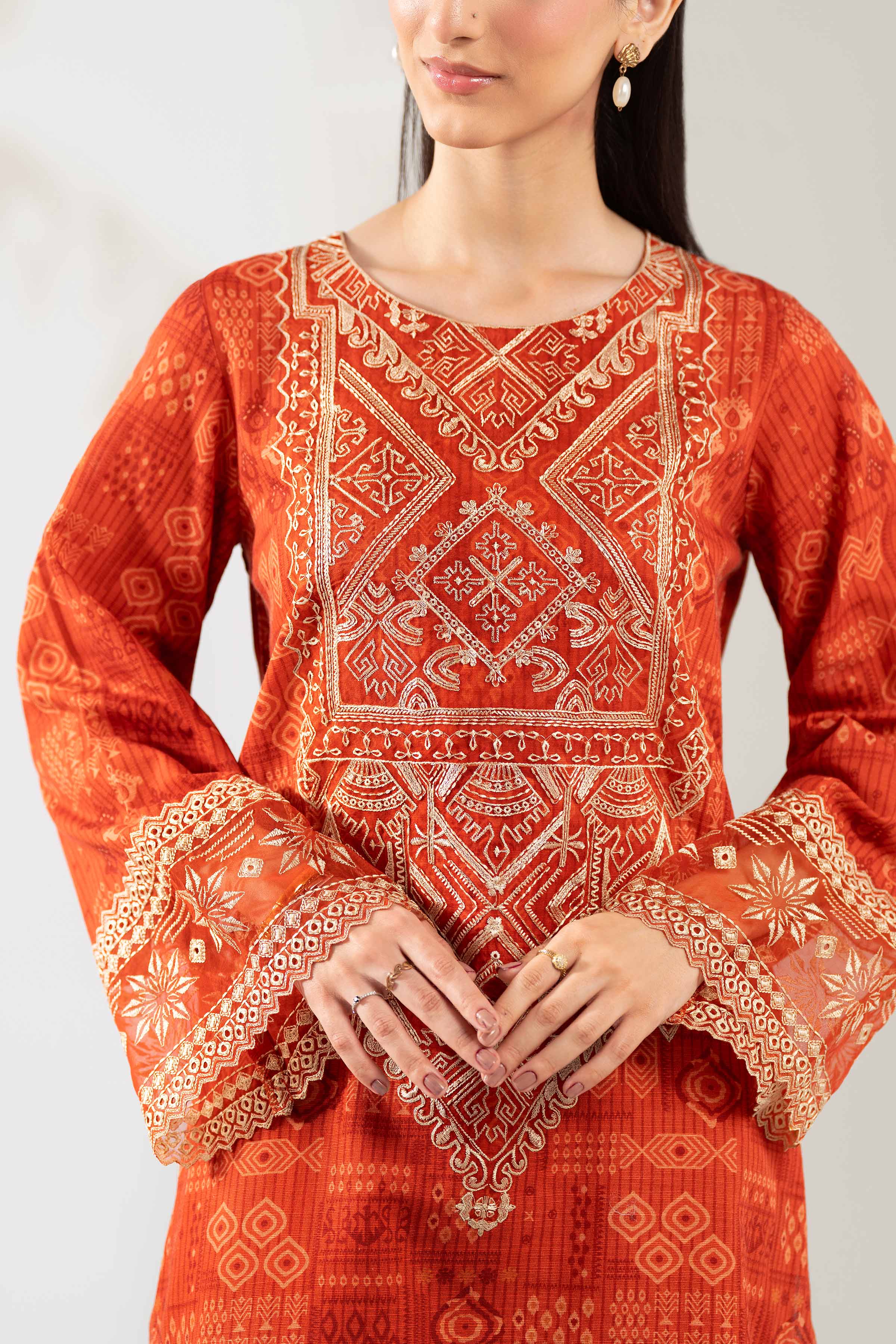 NISHATUAE - Rust Embroidered Khaddar 3-piece Unstitched Suit