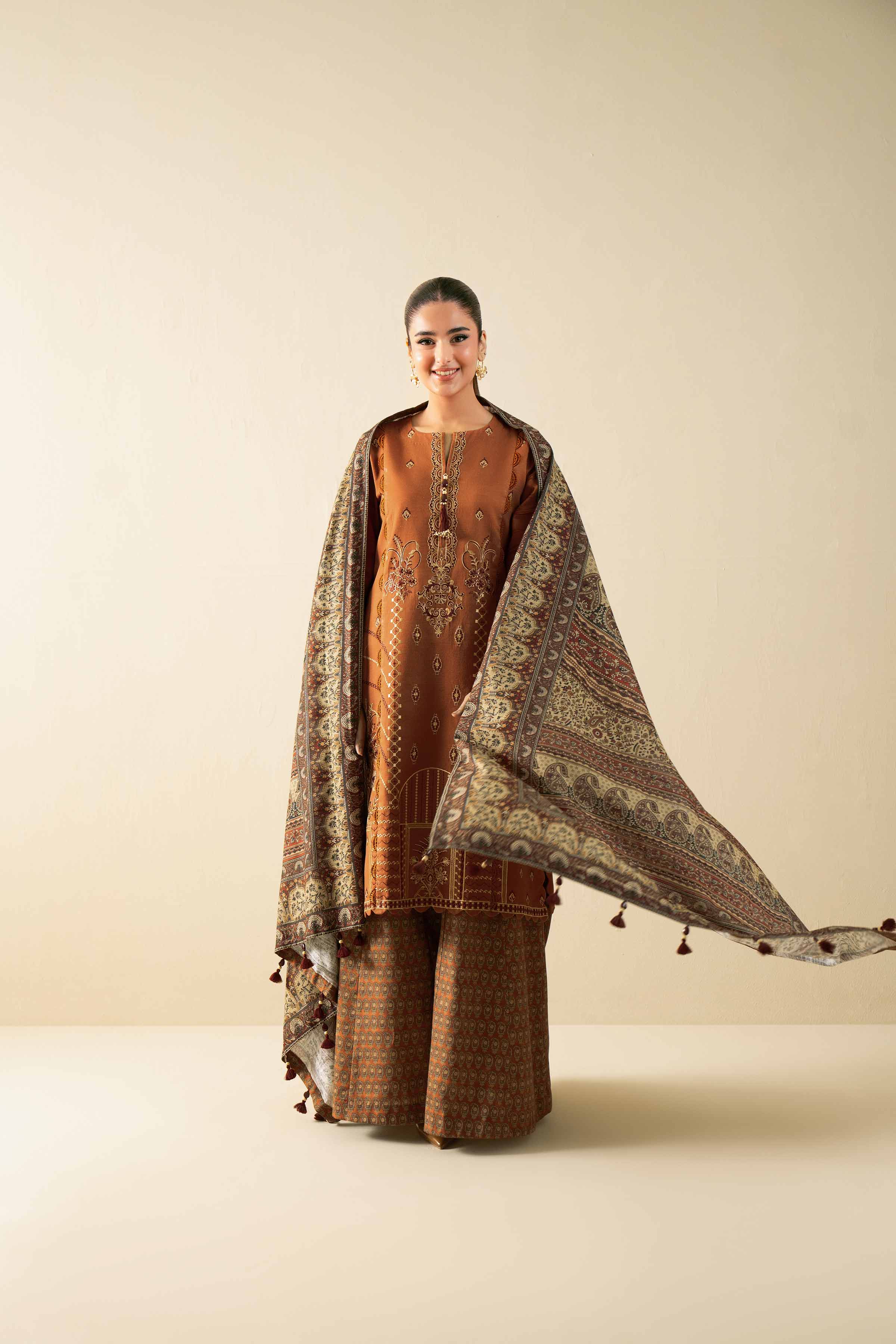 NISHATUAE - Rust Embroidered Khaddar 3-piece Unstitched Suit