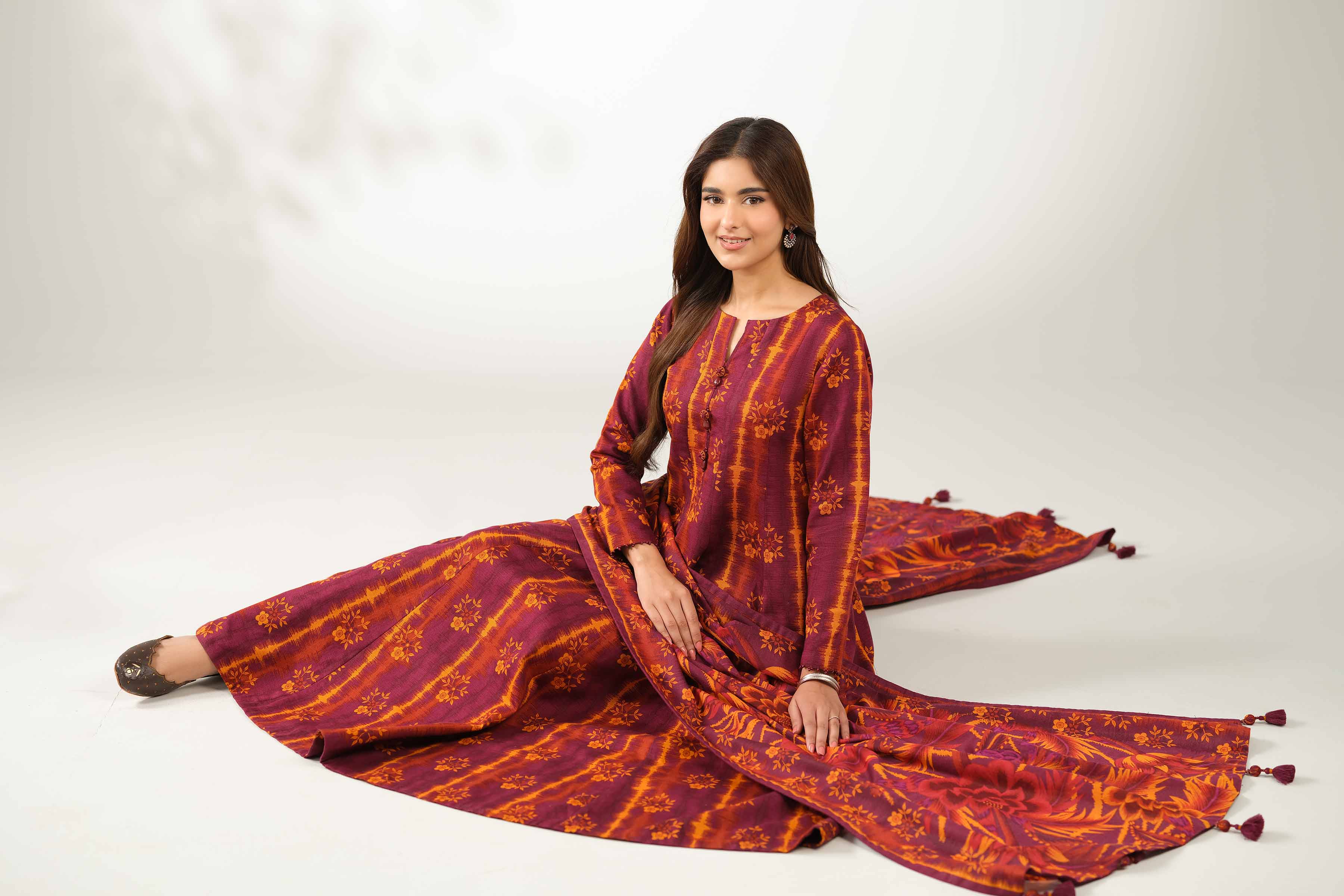 NISHATUAE - Burgundy Printed Khaddar 3-piece Unstitched Suit