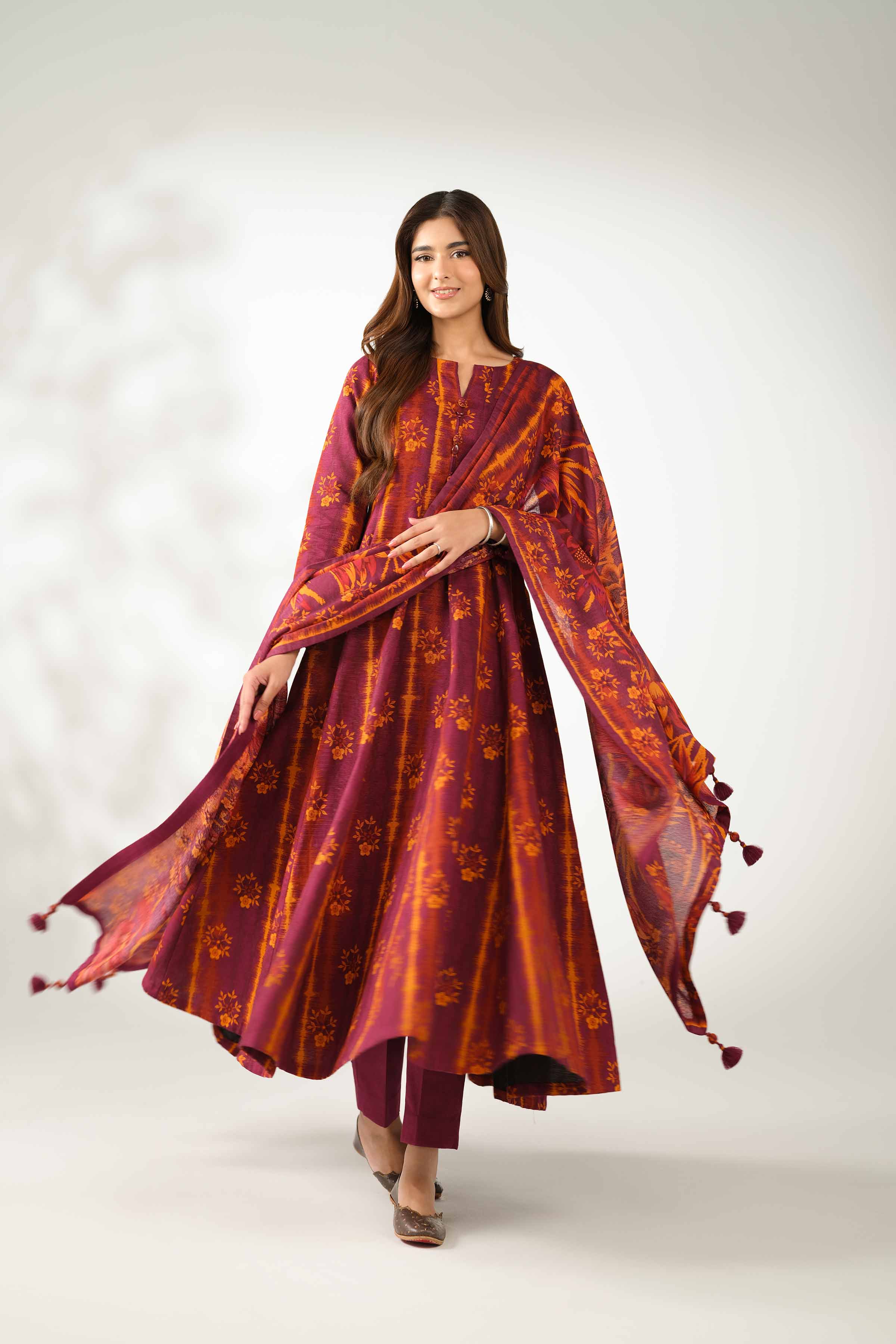 NISHATUAE - Burgundy Printed Khaddar 3-piece Unstitched Suit