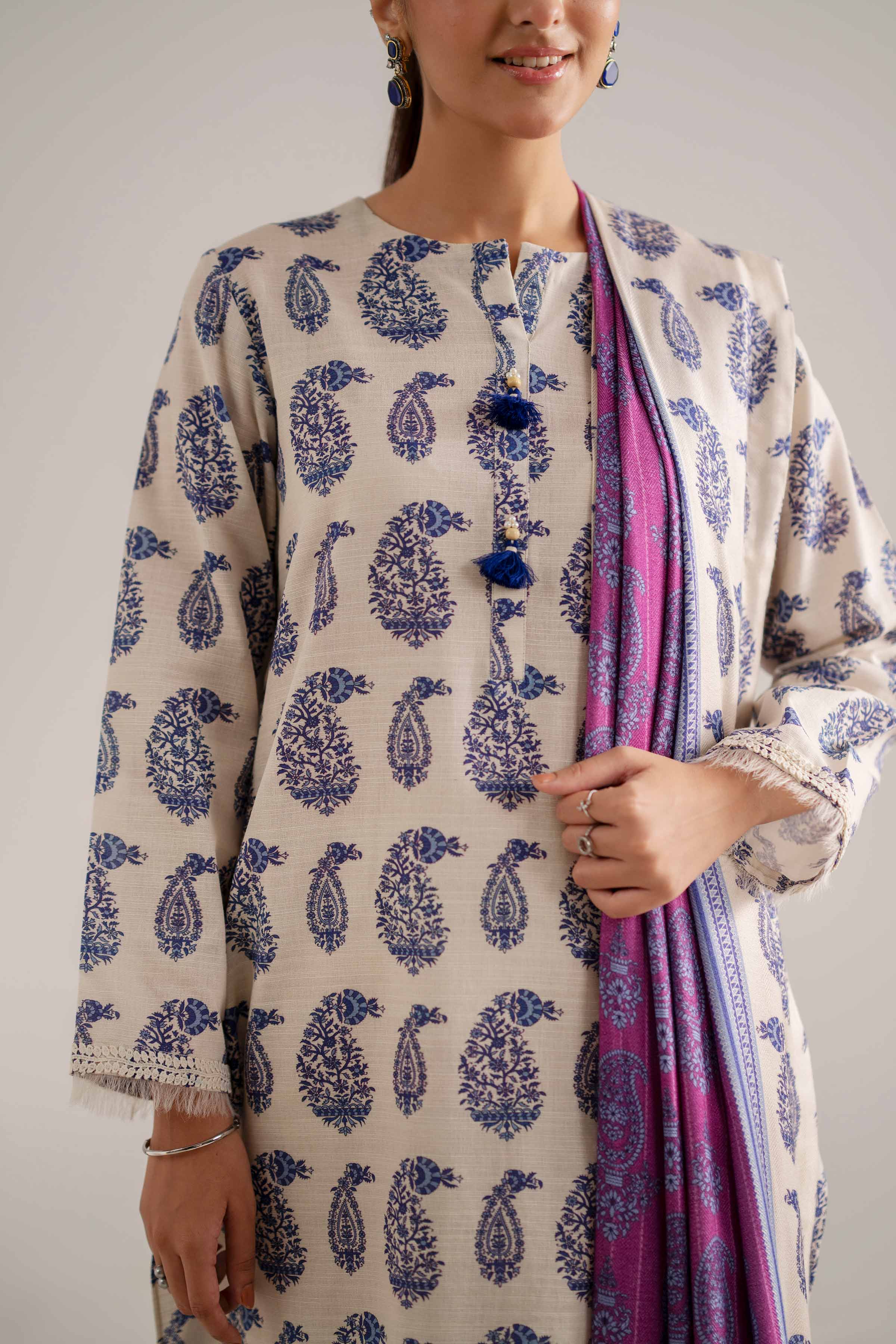 NISHATUAE - Beige & Purple Printed Khaddar 3-piece Unstitched Suit