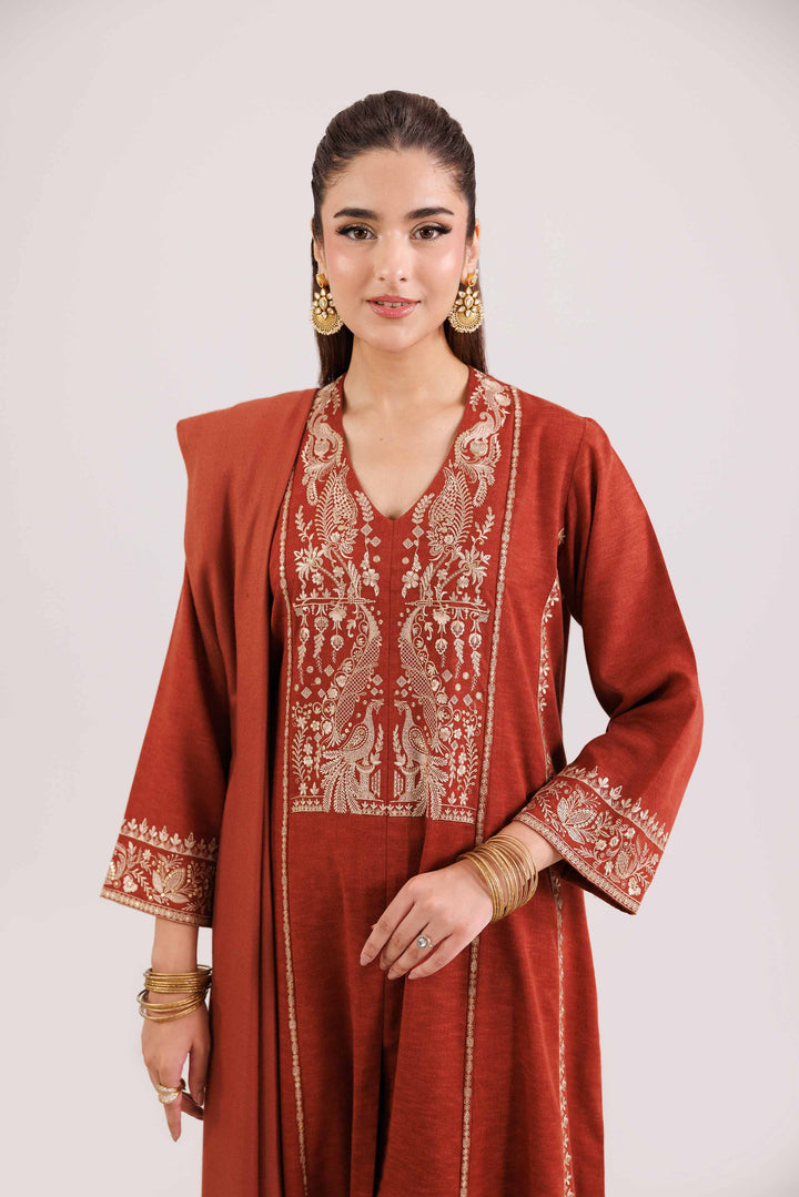 NISHATUAE - Red Embroidered Karandi 3-piece Ready to wear Suit