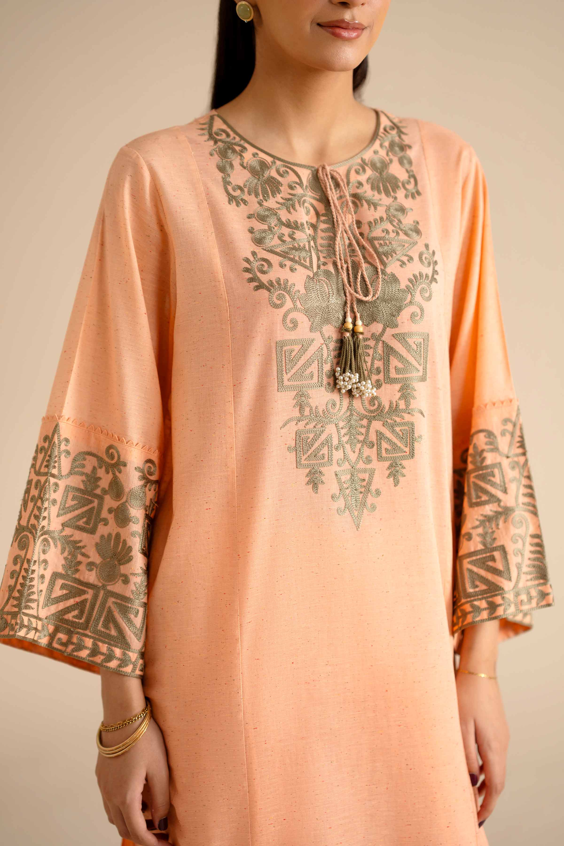 NISHATUAE - Orange Embroidered Khaddar 2-piece Ready to wear Dress