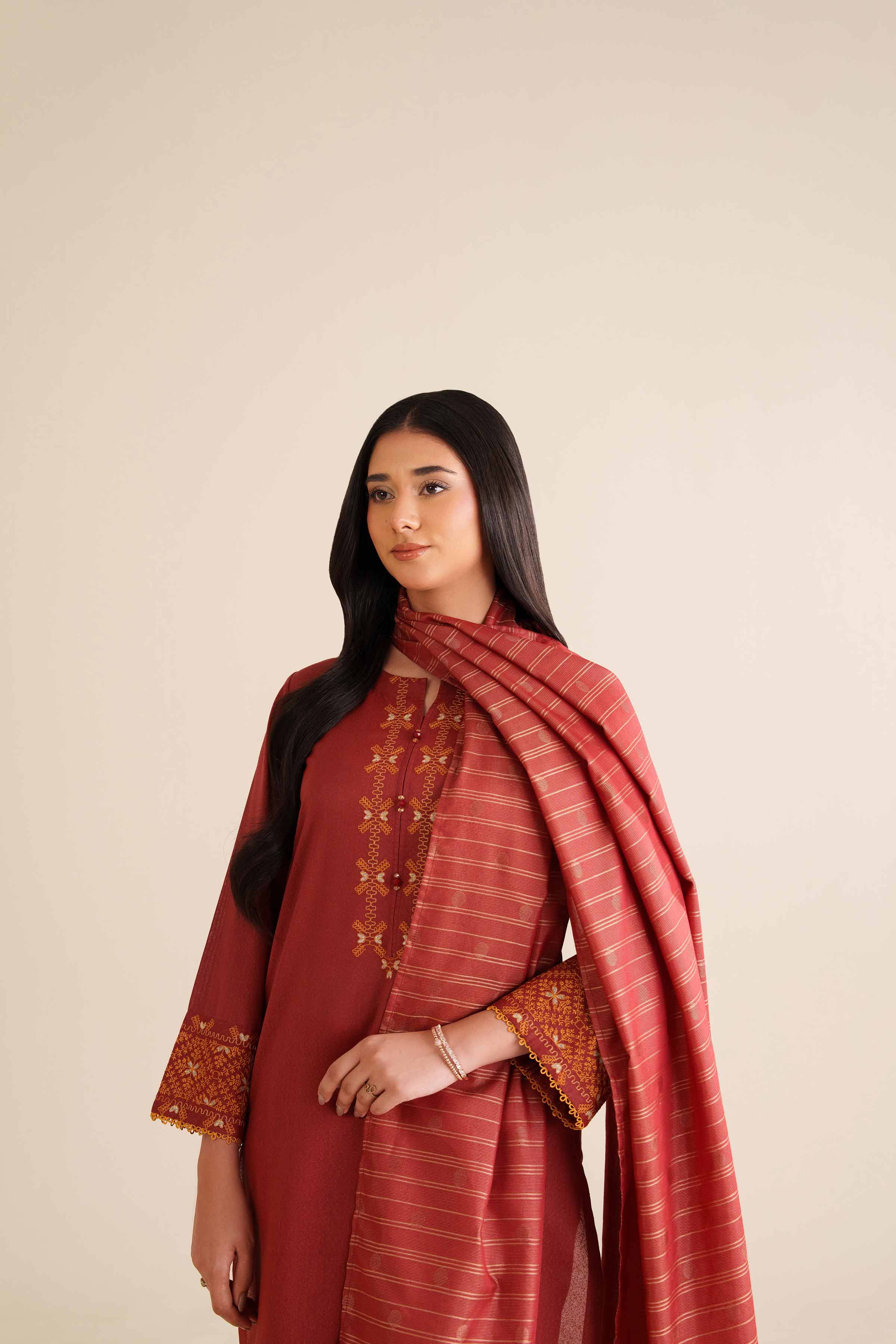 NISHATUAE - Red Embroidered Karandi 3-piece Ready to wear Suit
