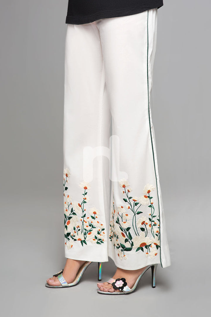 PS19-141 White Embroidered Stitched Boot Cut Cambric Trouser for Women - Nishat Linen UAE